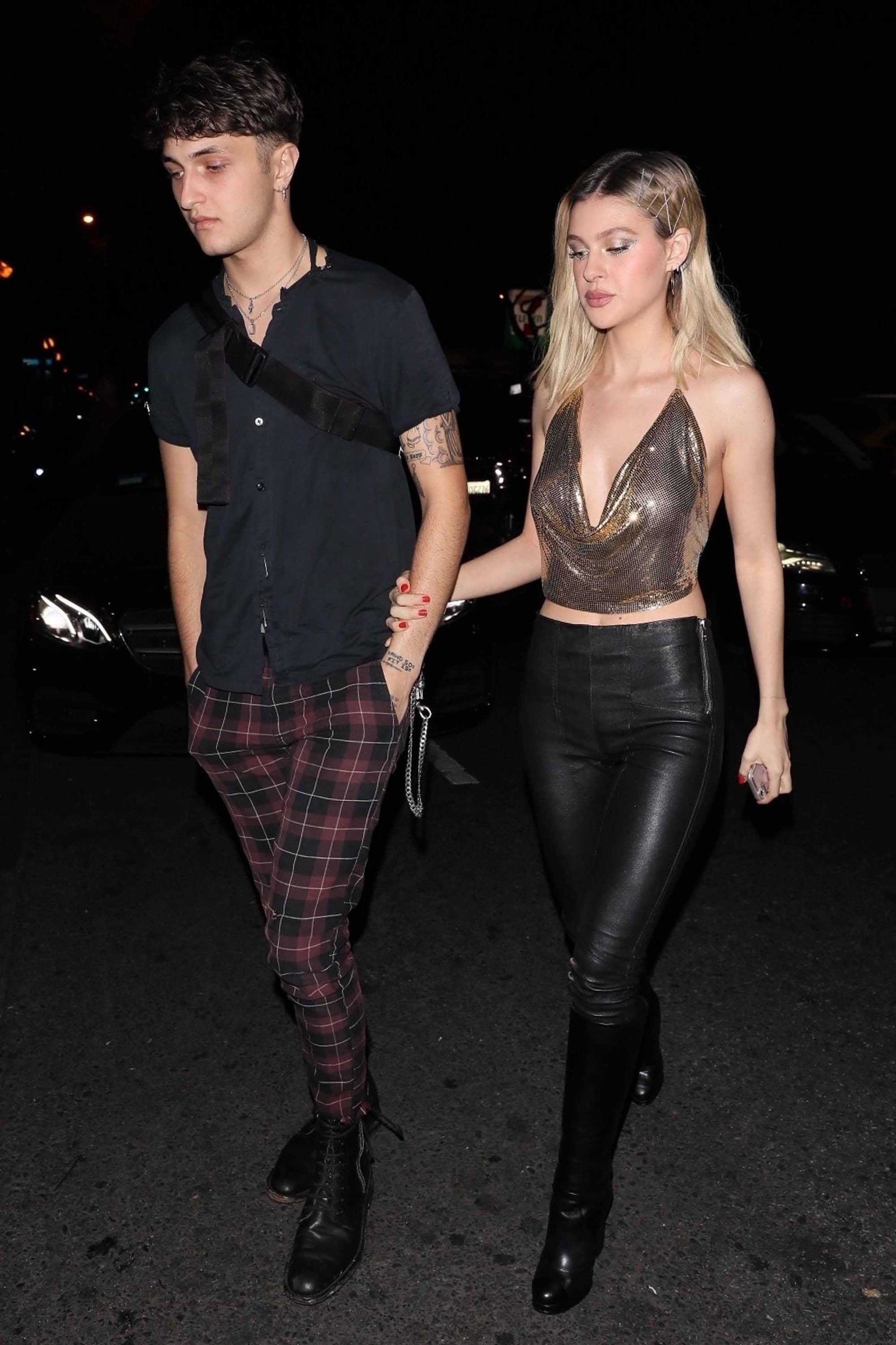 Nicola Peltz attends a Halloween party