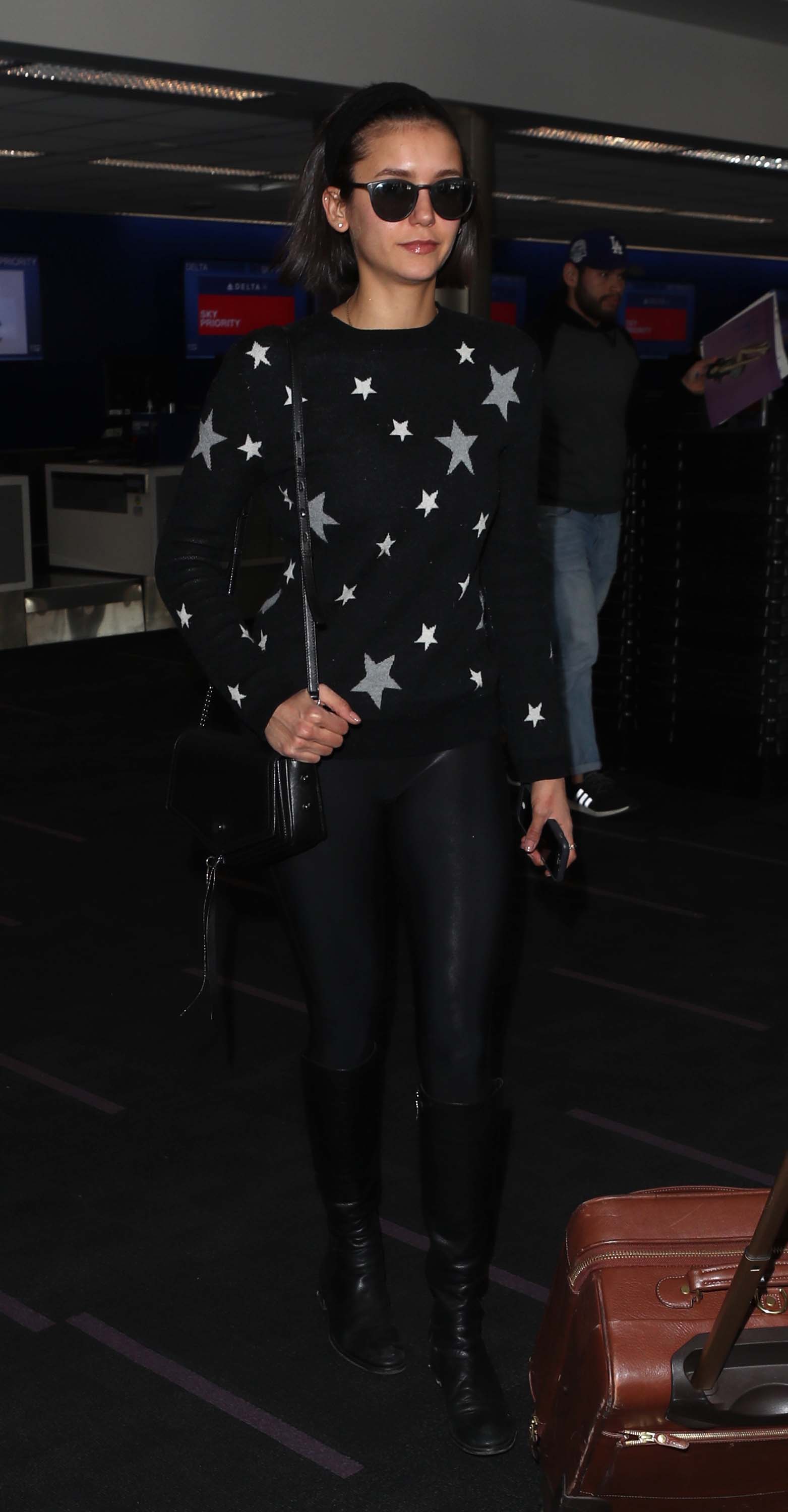 Nina Dobrev departs LAX