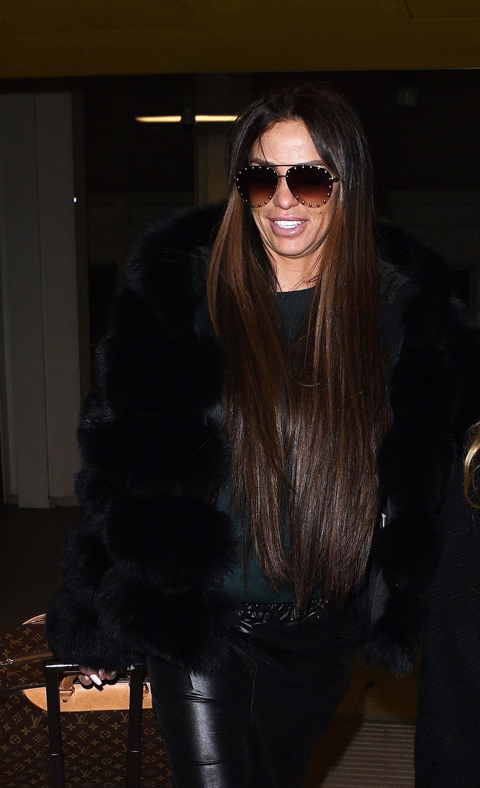 Katie Price flies out of London Gatwick