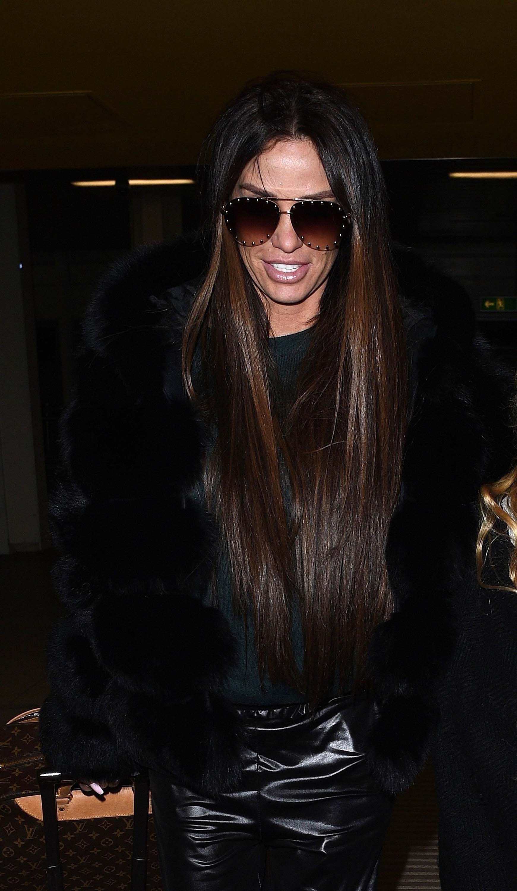 Katie Price flies out of London Gatwick