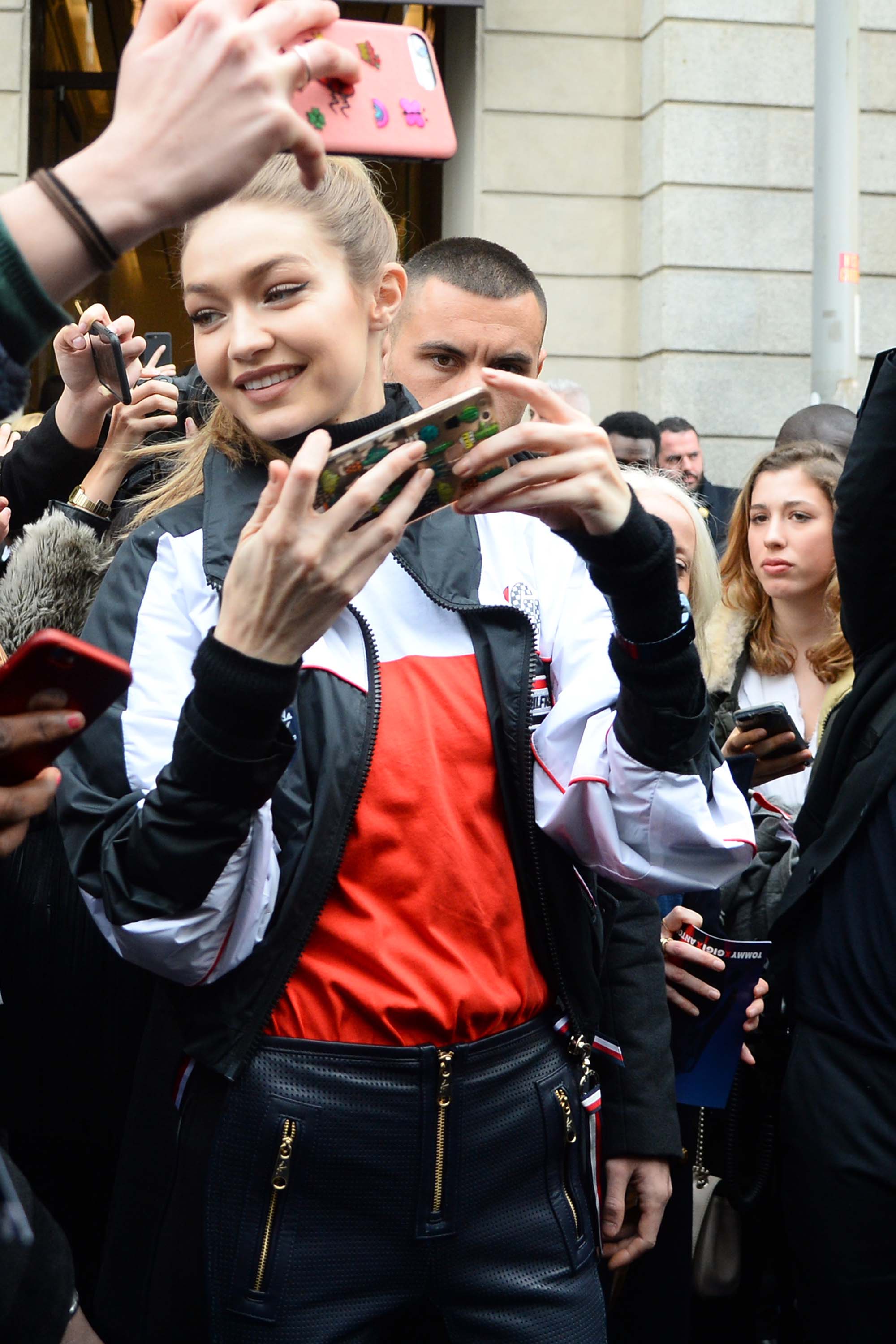 Gigi Hadid greeting fans outside TommyXGigi Capsule Collection Presentation