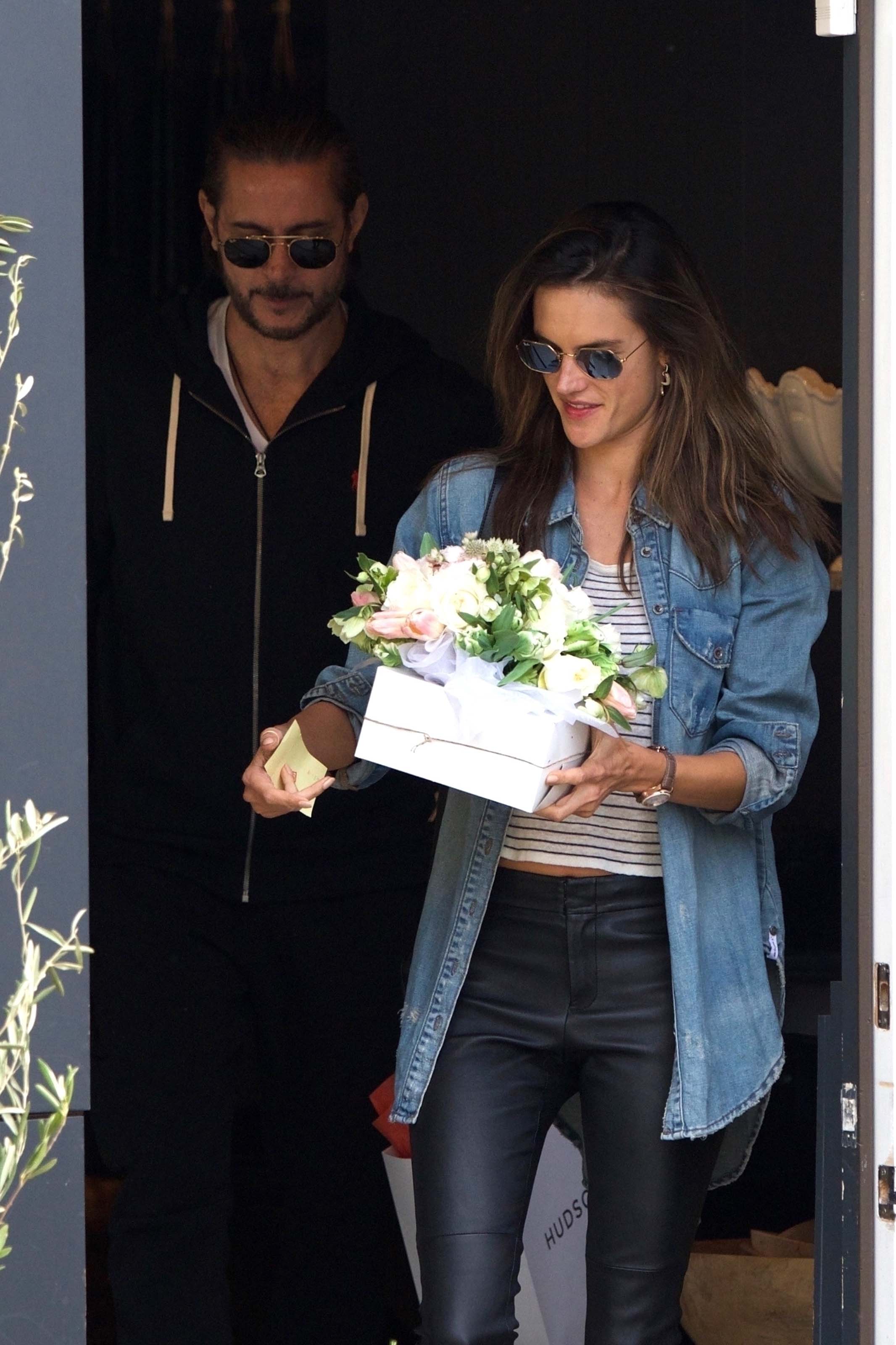 Alessandra Ambrosio grabs some flowers for Easter