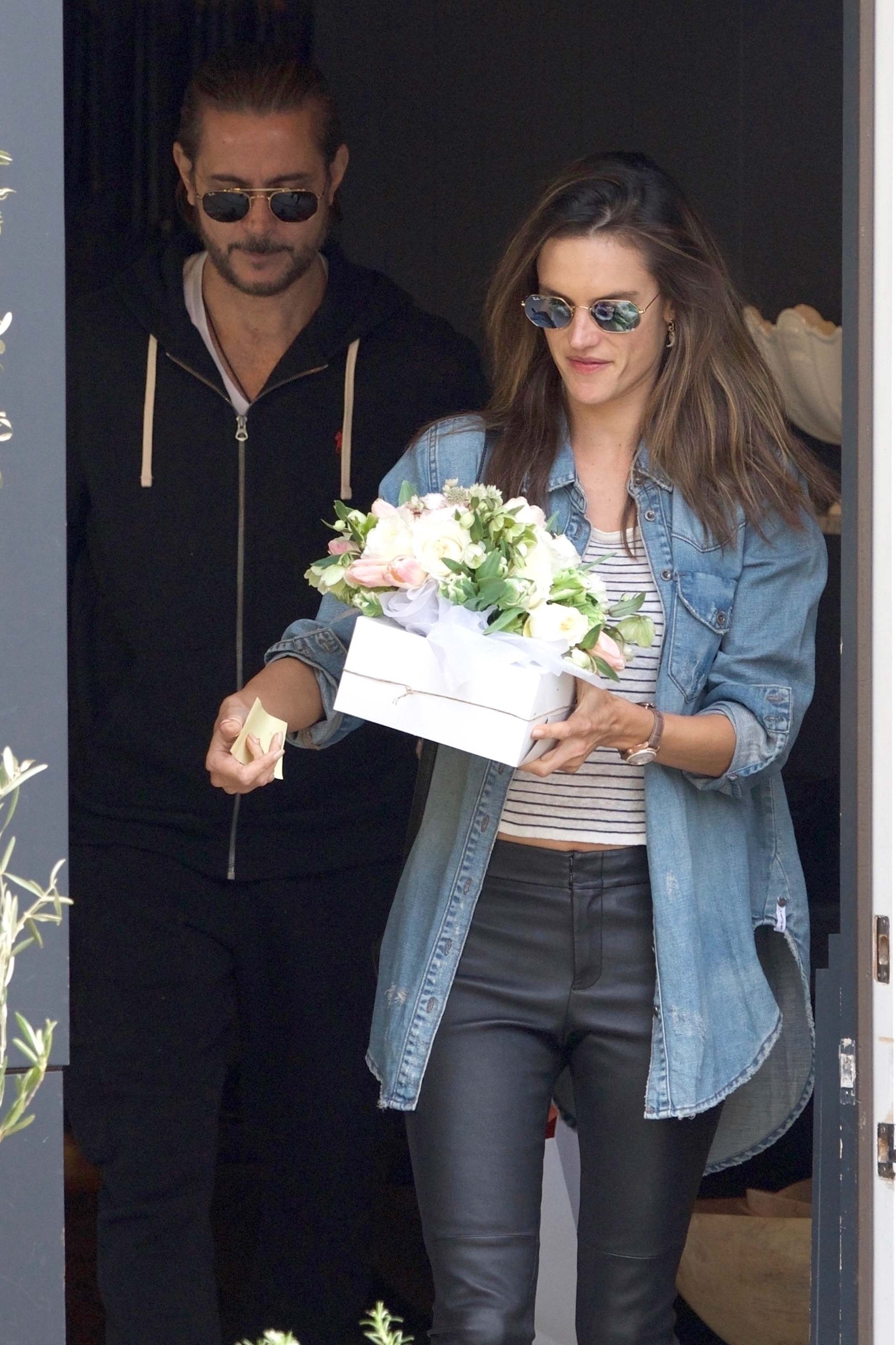 Alessandra Ambrosio grabs some flowers for Easter