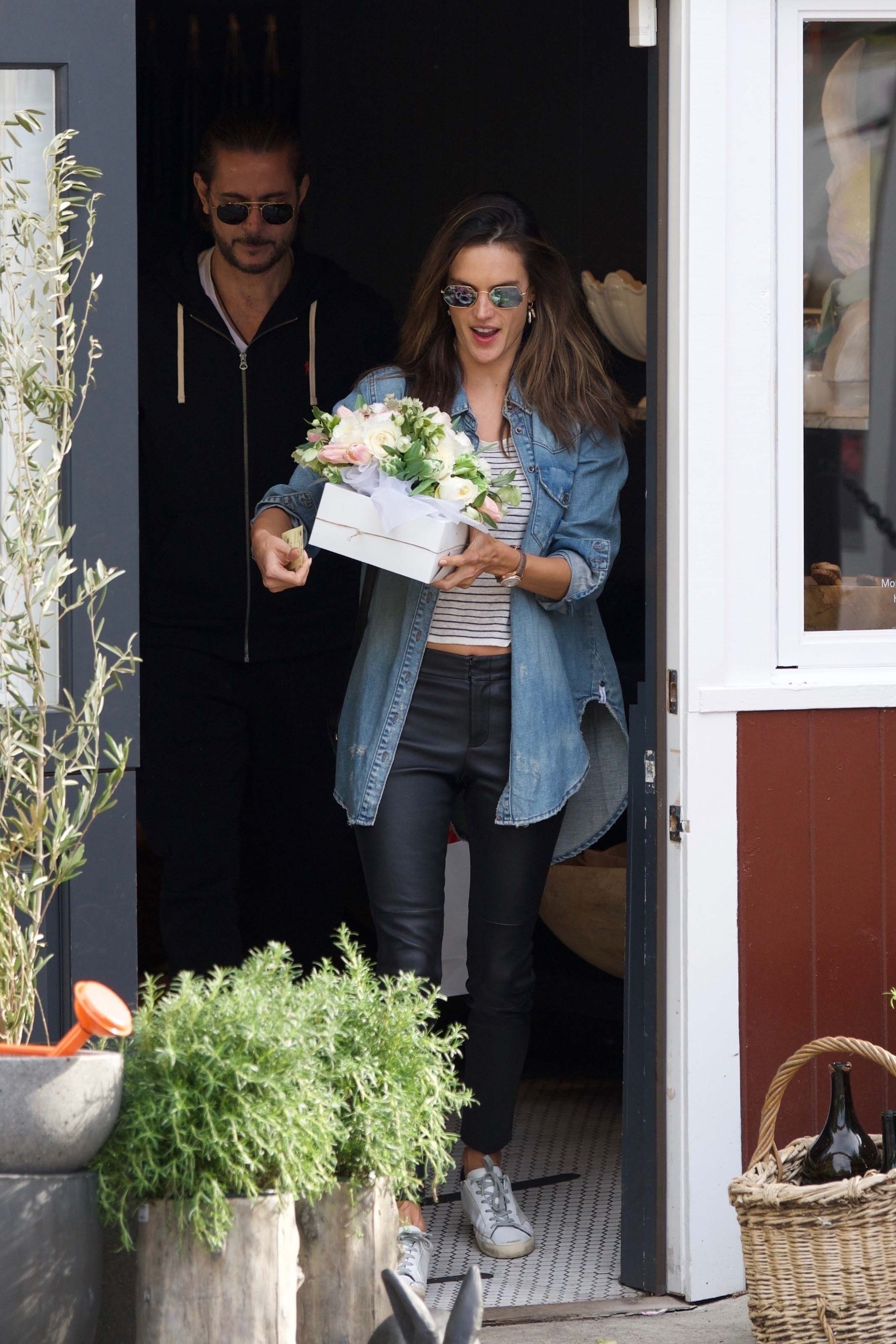 Alessandra Ambrosio grabs some flowers for Easter