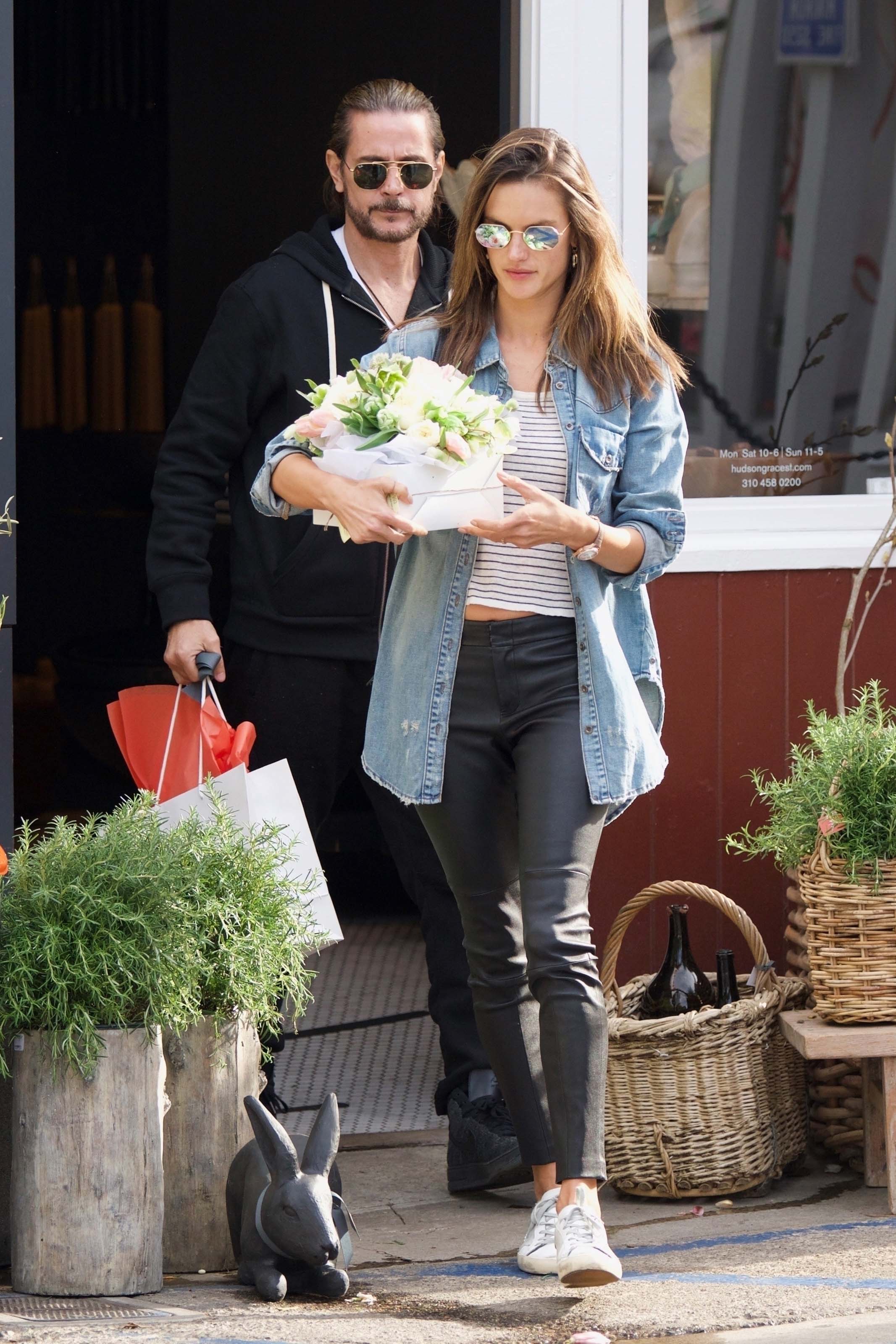 Alessandra Ambrosio grabs some flowers for Easter