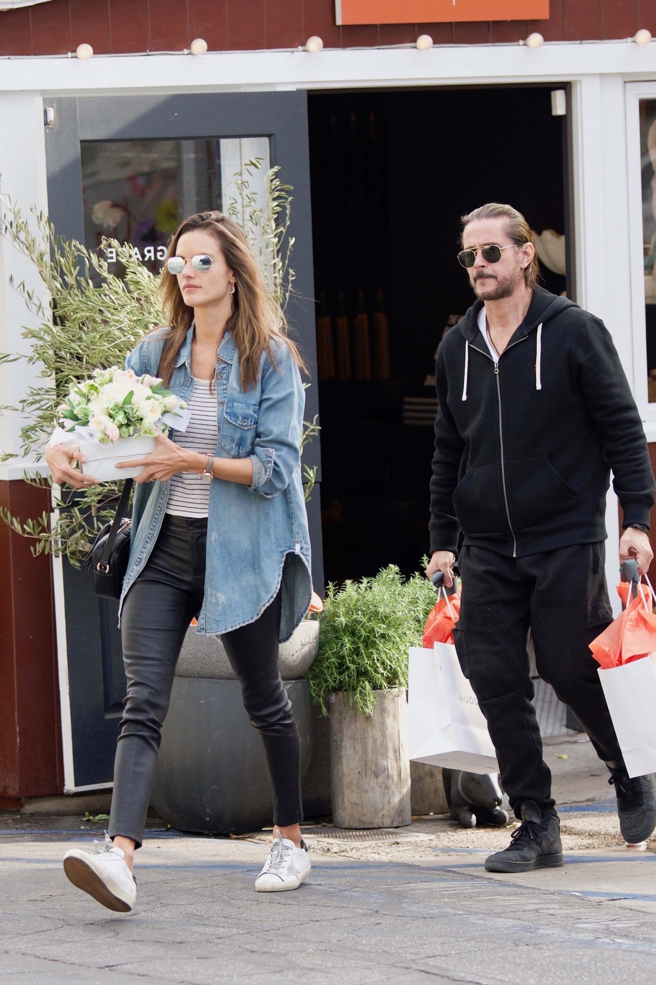 Alessandra Ambrosio grabs some flowers for Easter