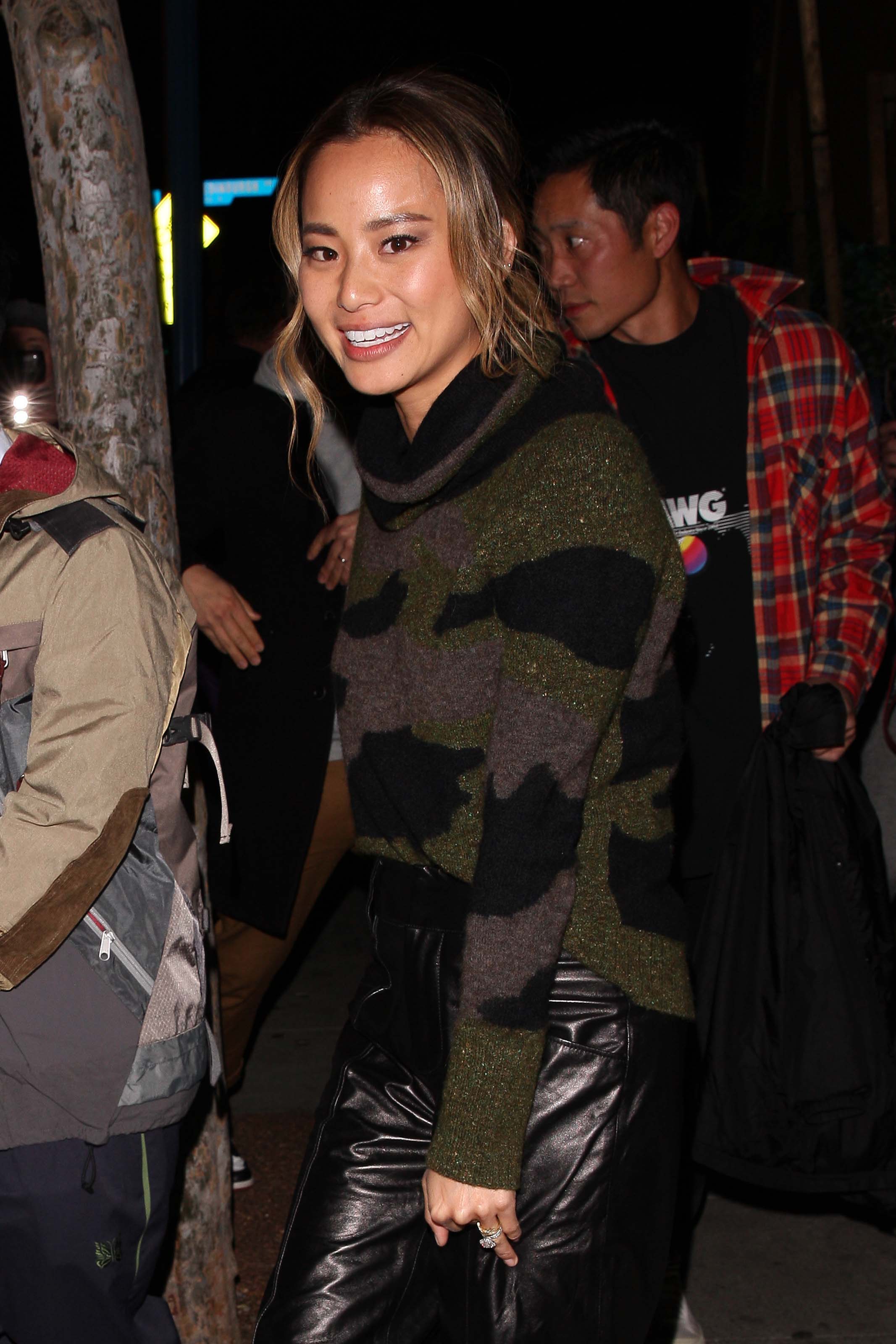 Jamie Chung leaves the Delilah club with a male friend