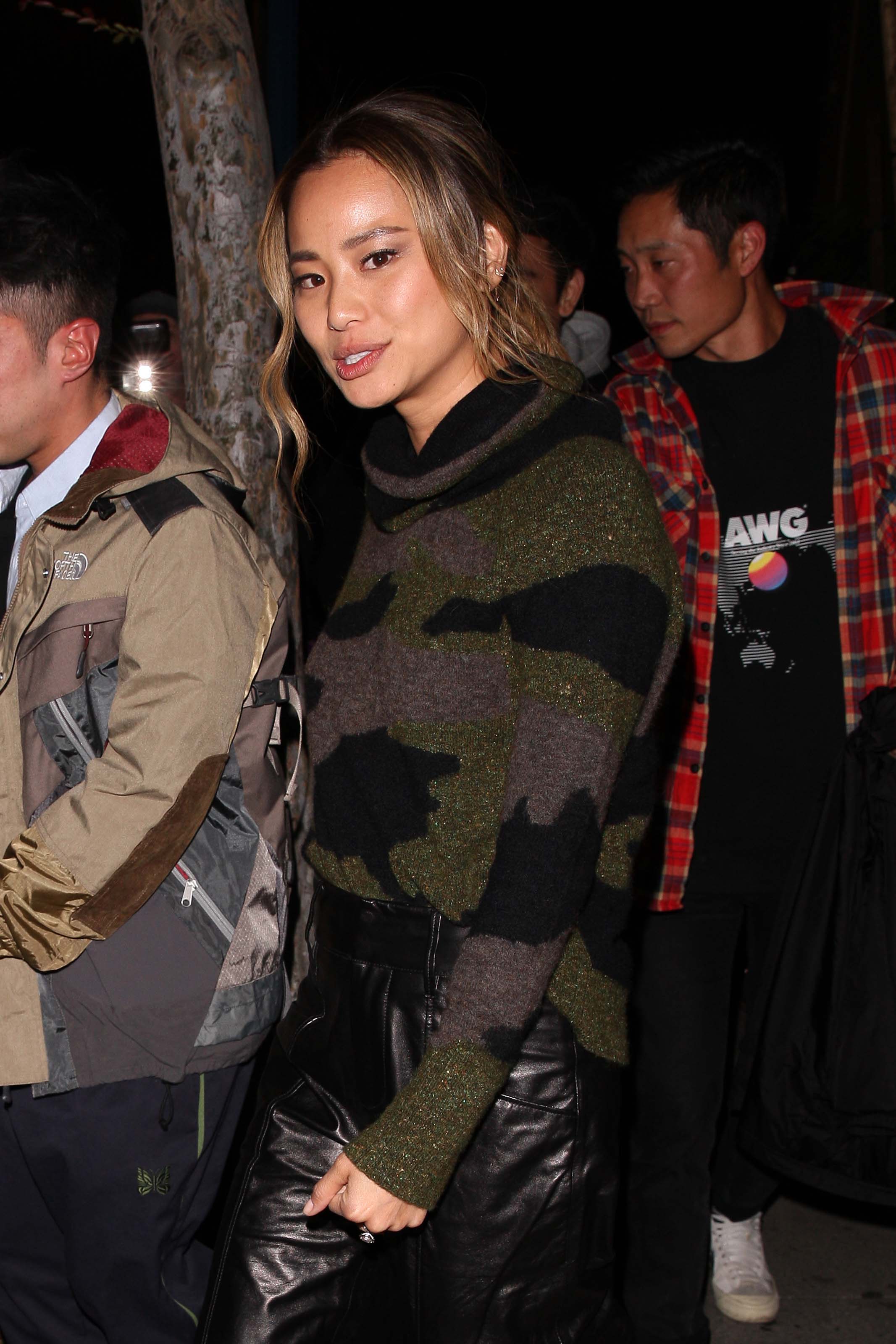 Jamie Chung leaves the Delilah club with a male friend