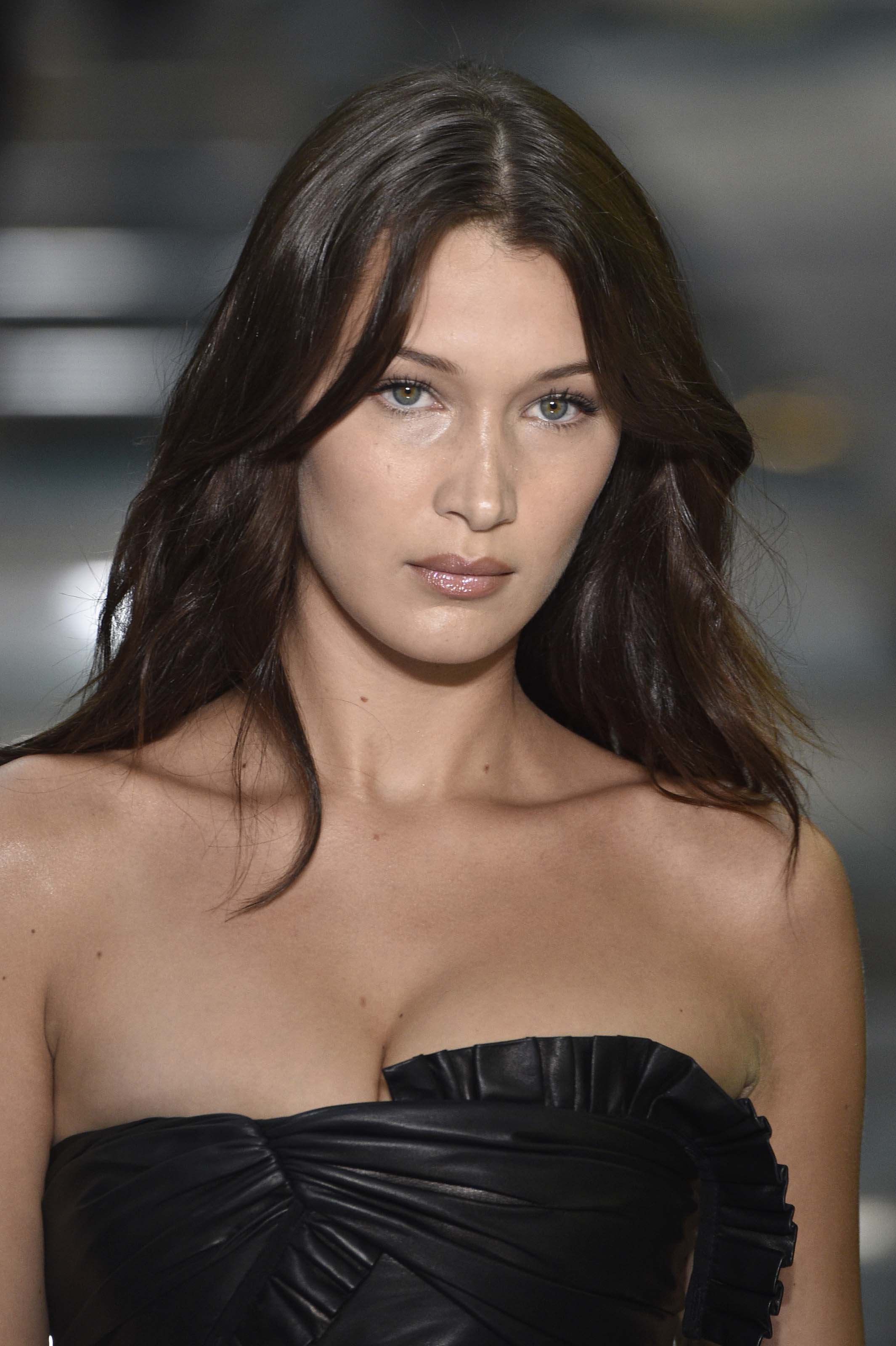 Bella Hadid walking the runway for Versace Fashion Show