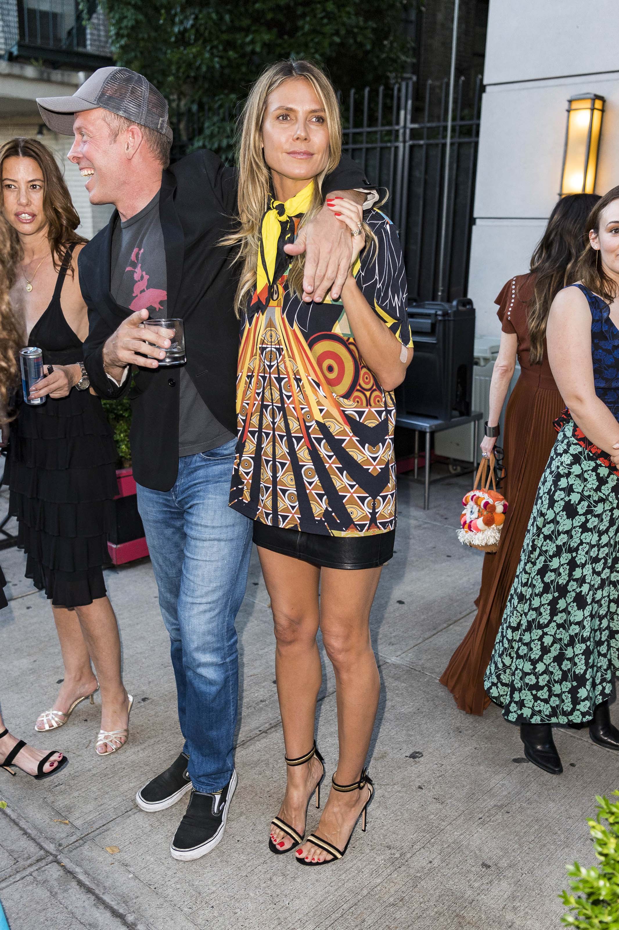 Heidi Klum heads to a party