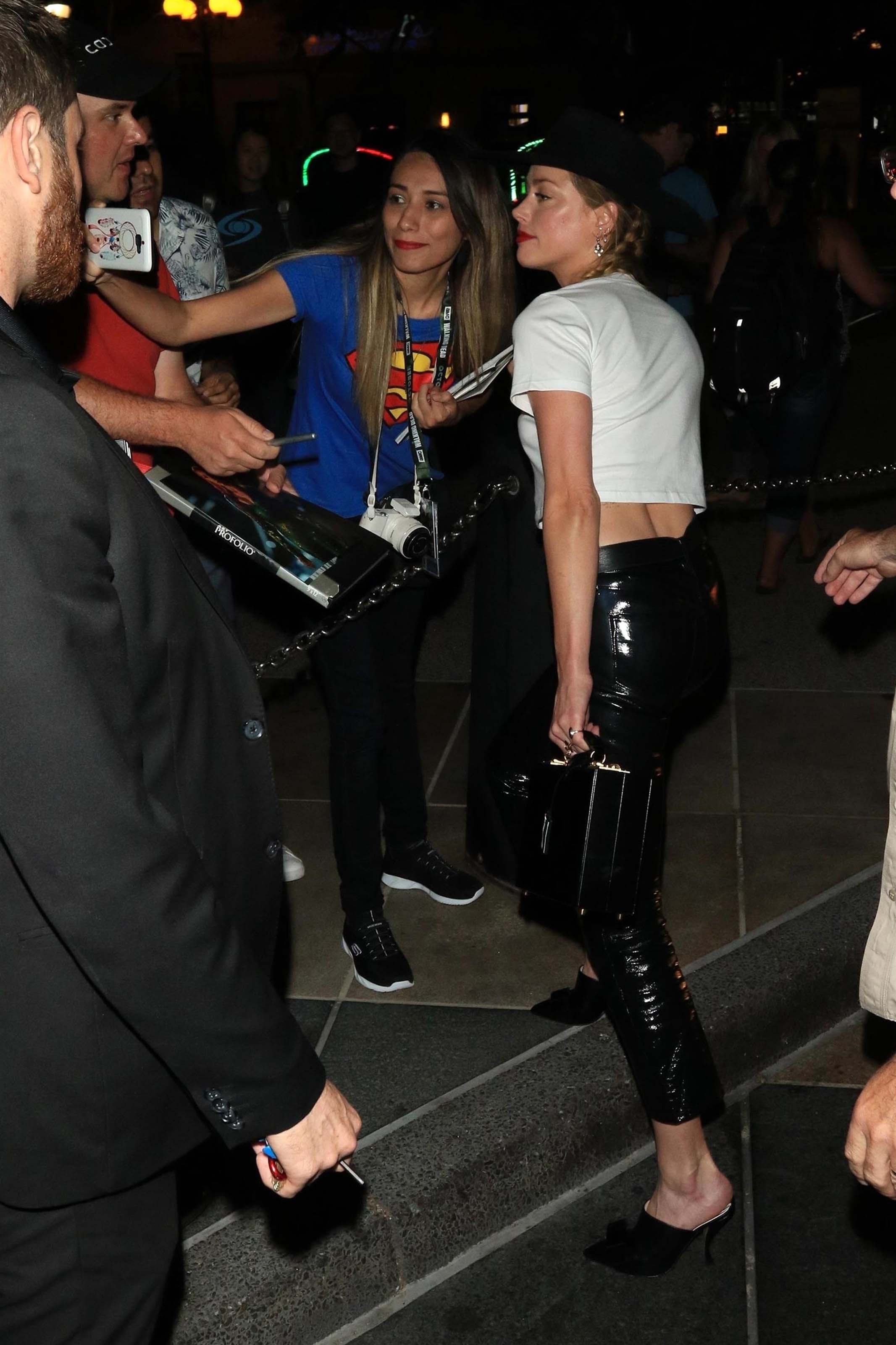 Amber Heard greets her adoring fans outside of the Hard Rock Hotel