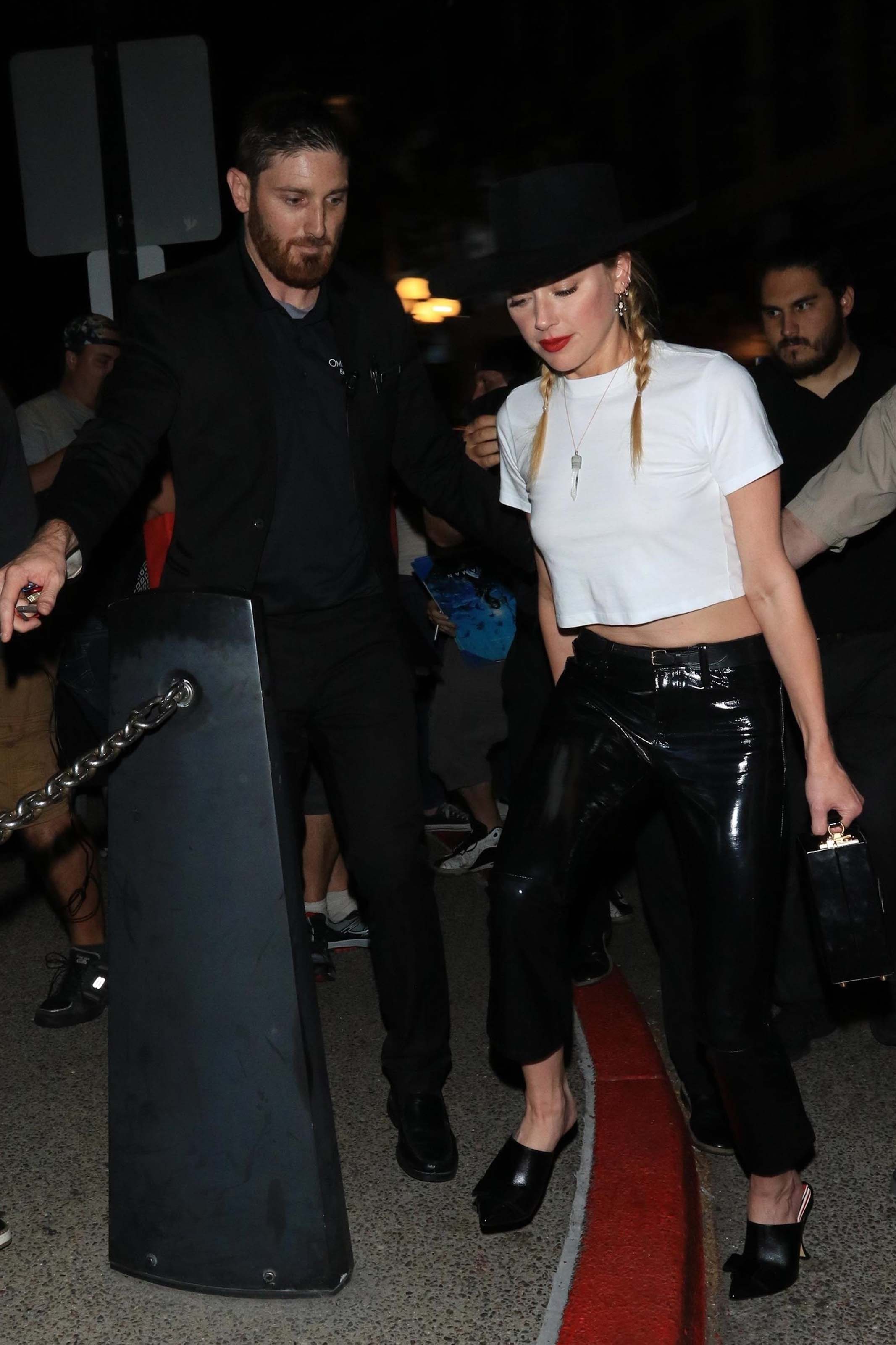 Amber Heard greets her adoring fans outside of the Hard Rock Hotel