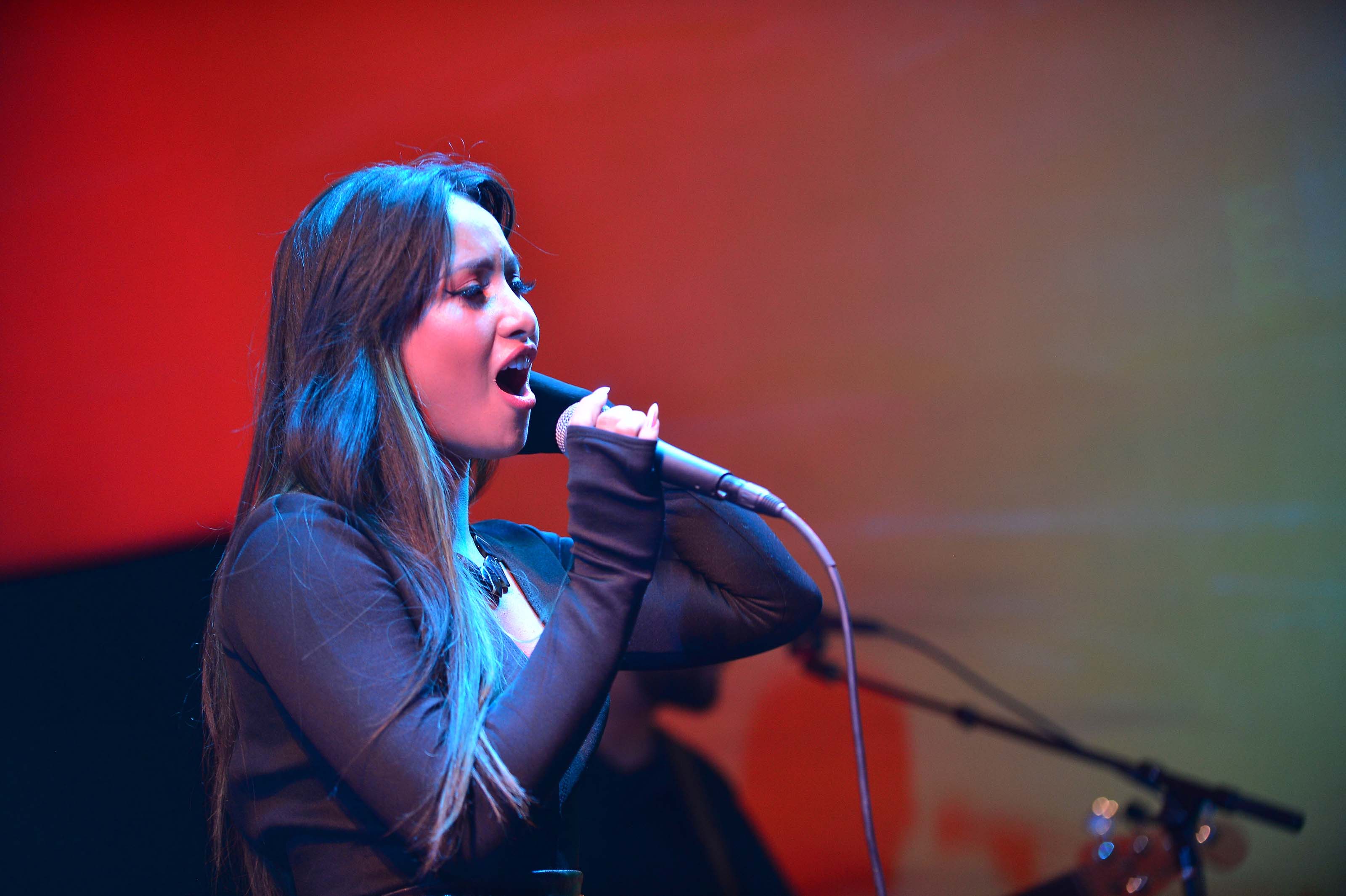 Michelle Sussett performs on stage