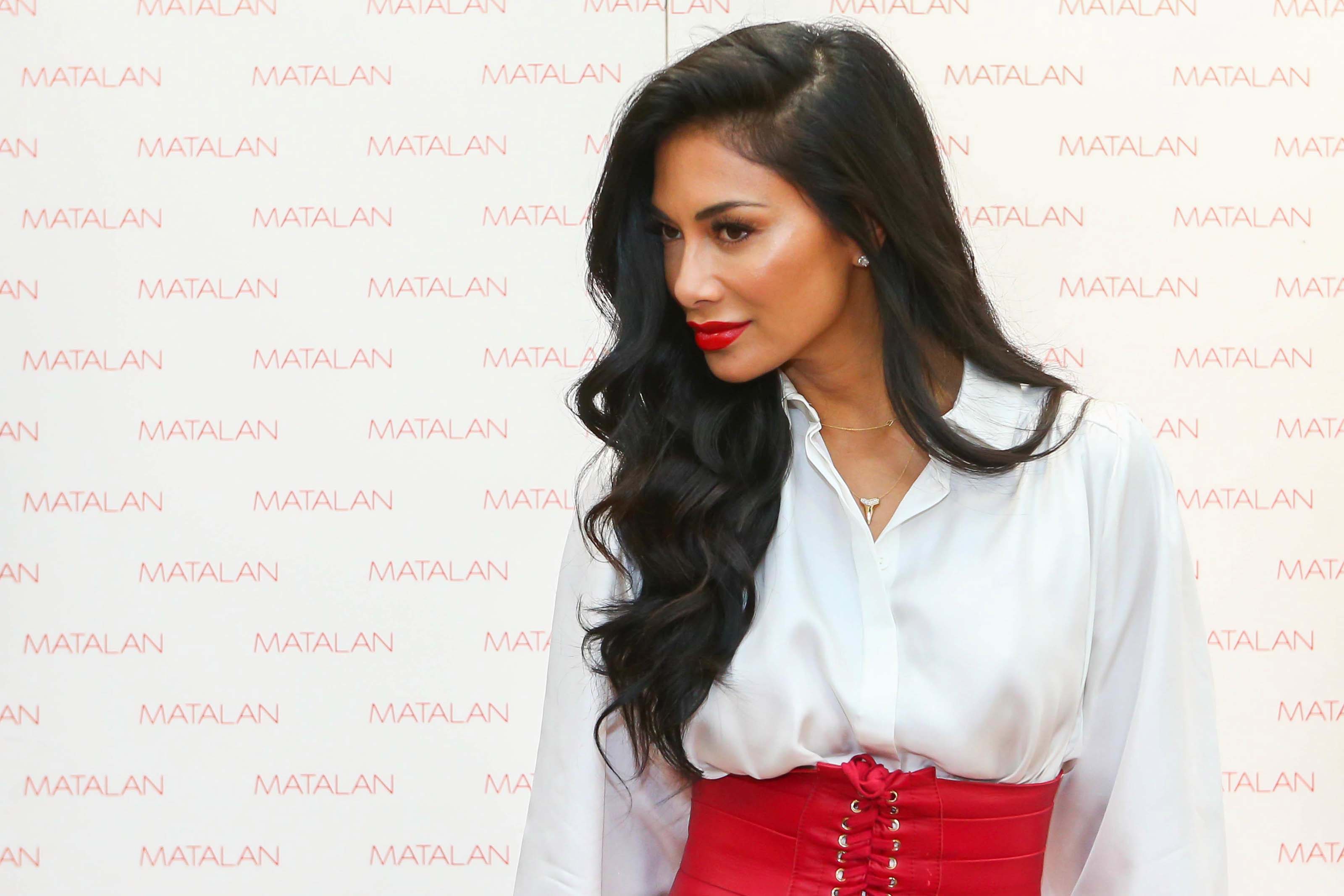 Nicole Scherzinger promoting Her Perfume ‘Chosen’