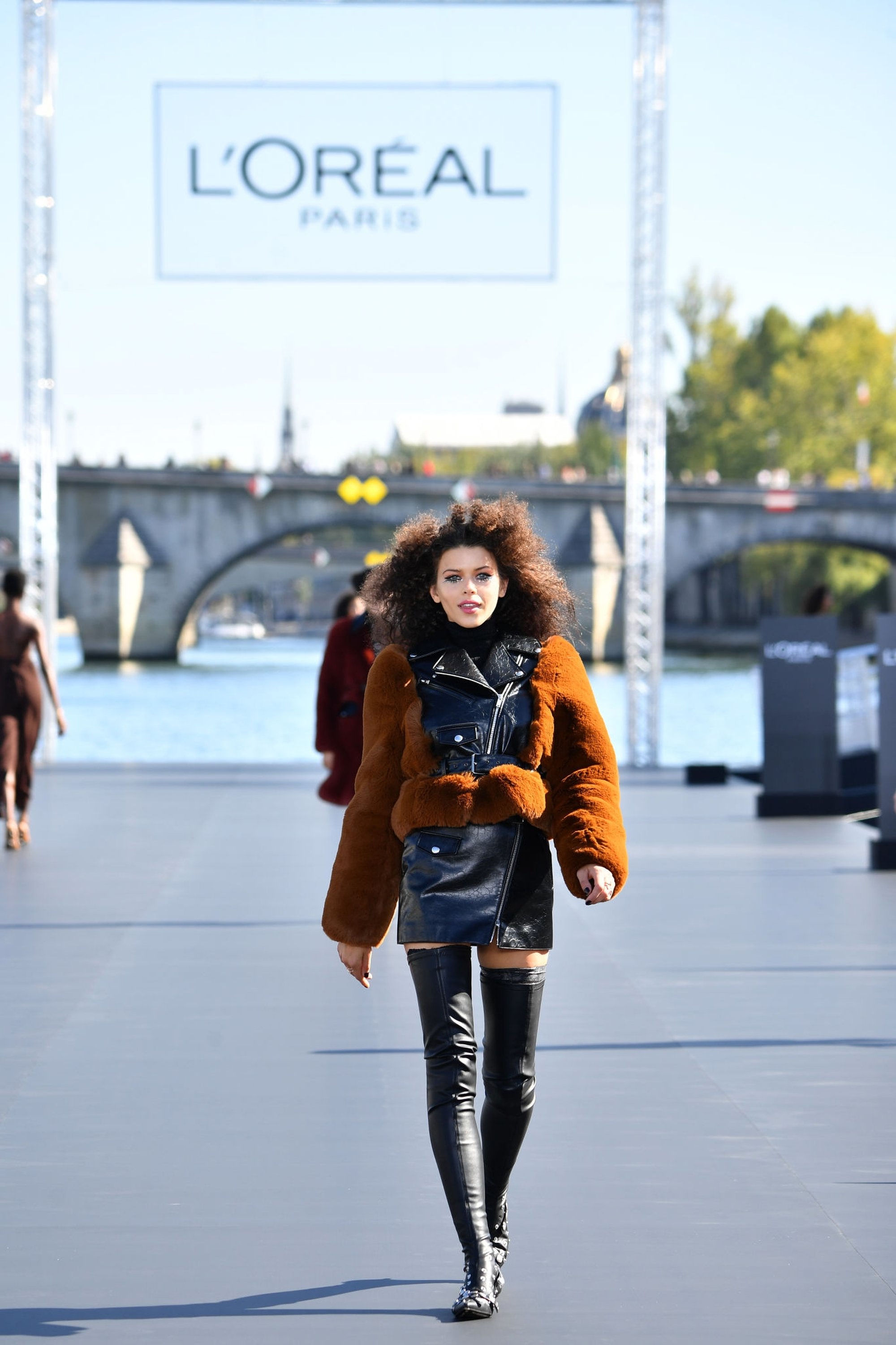 Georgia Fowler walks the runway during Le Defile L’Oreal Paris