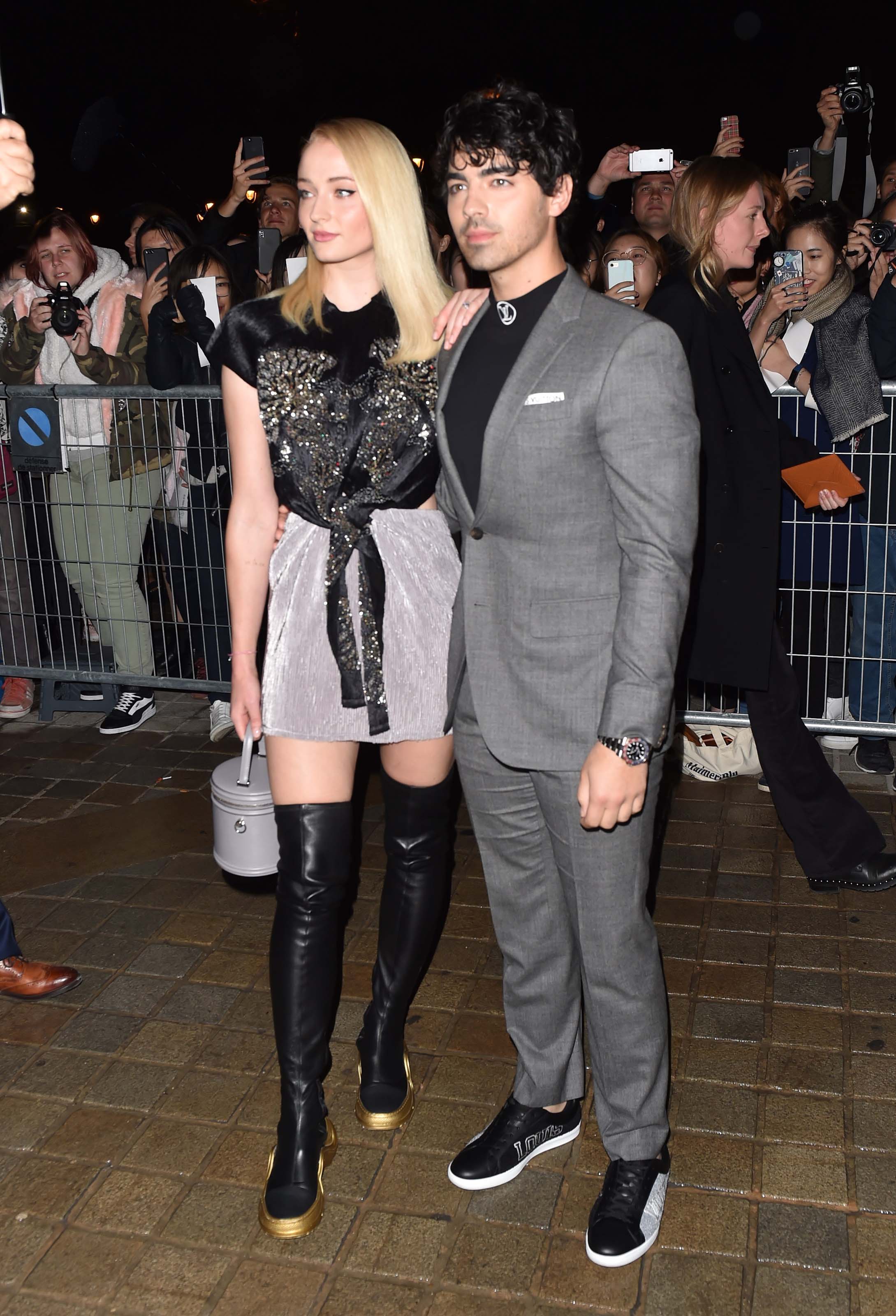 Sophie Turner Wore A Leather Blazer & LV Boots