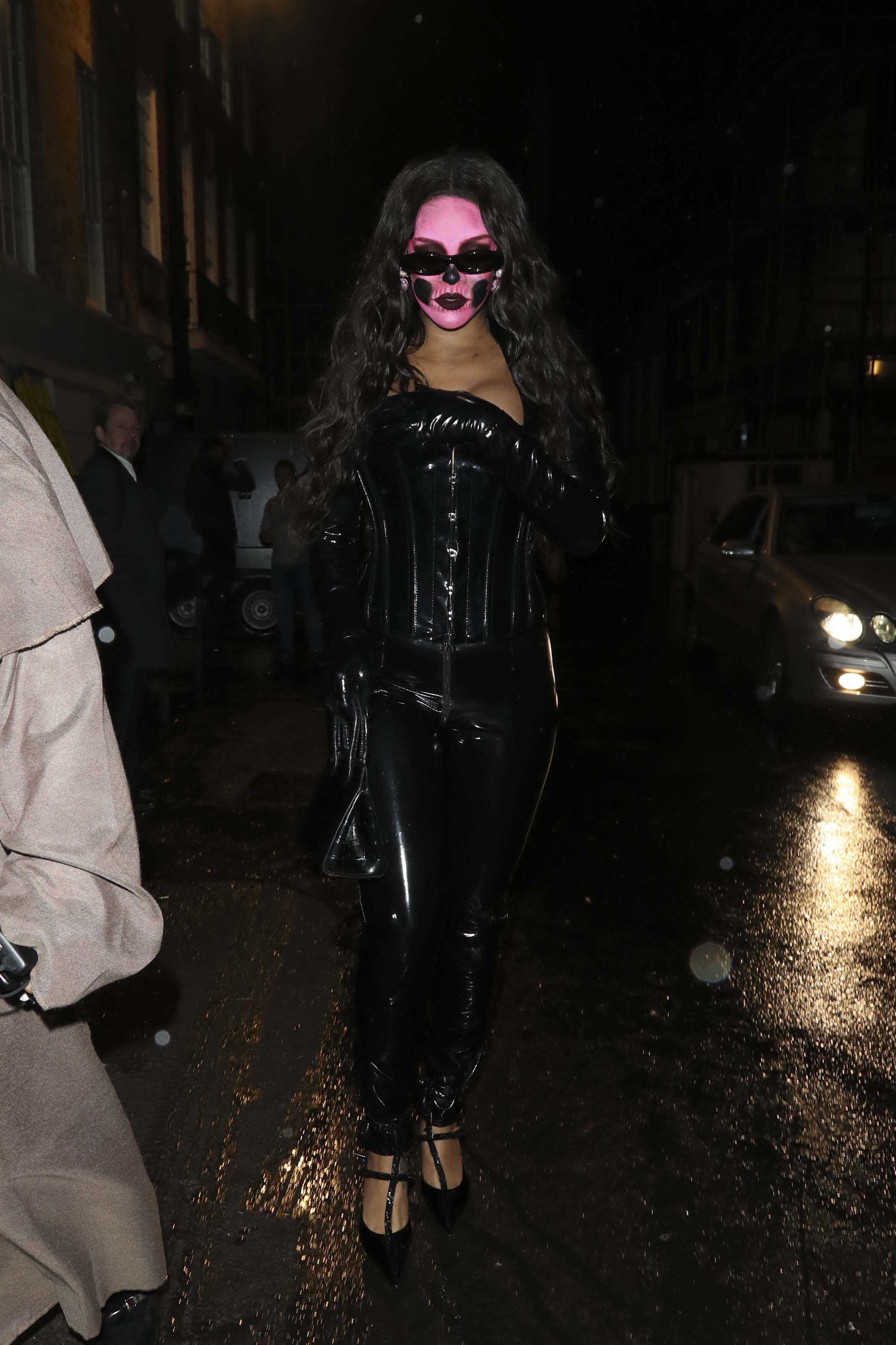 Rihanna attends a Halloween party