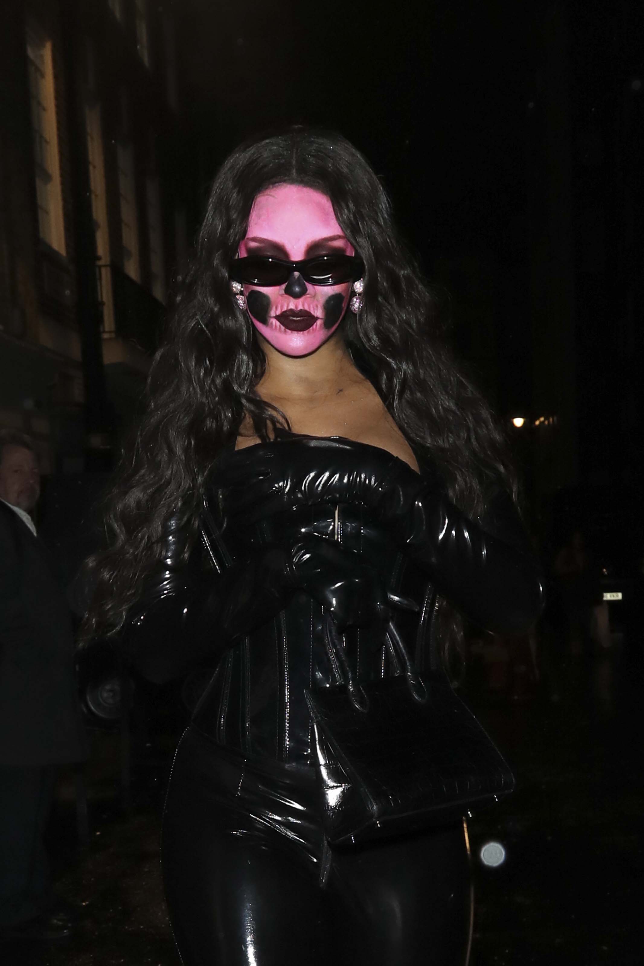 Rihanna attends a Halloween party