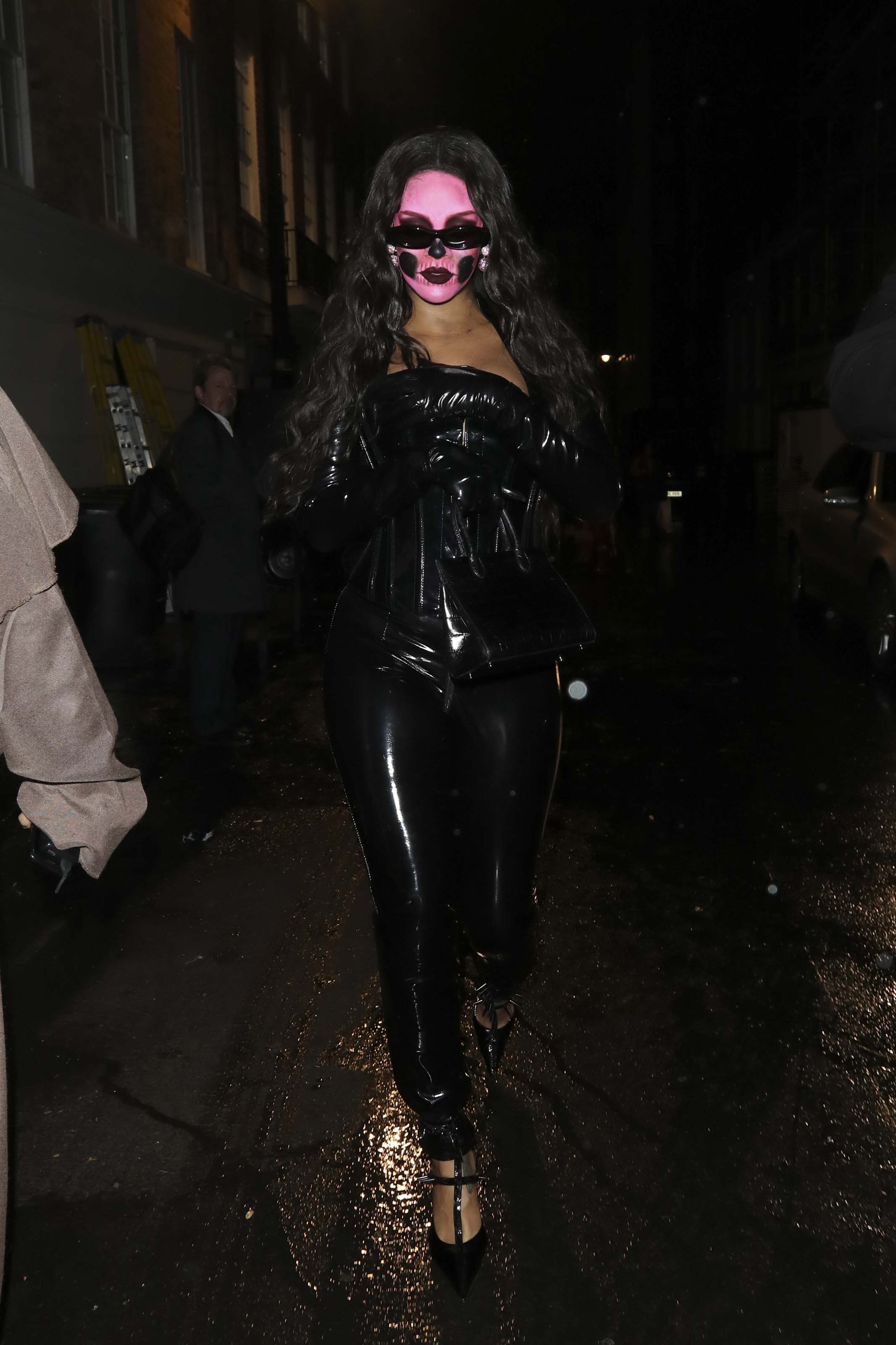Rihanna attends a Halloween party