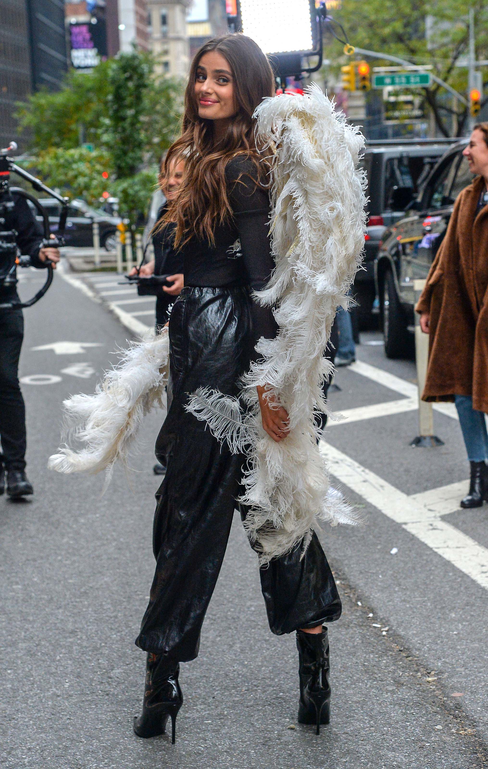 Taylor Hill films a small promo event in NYC showcasing her Angel Wings