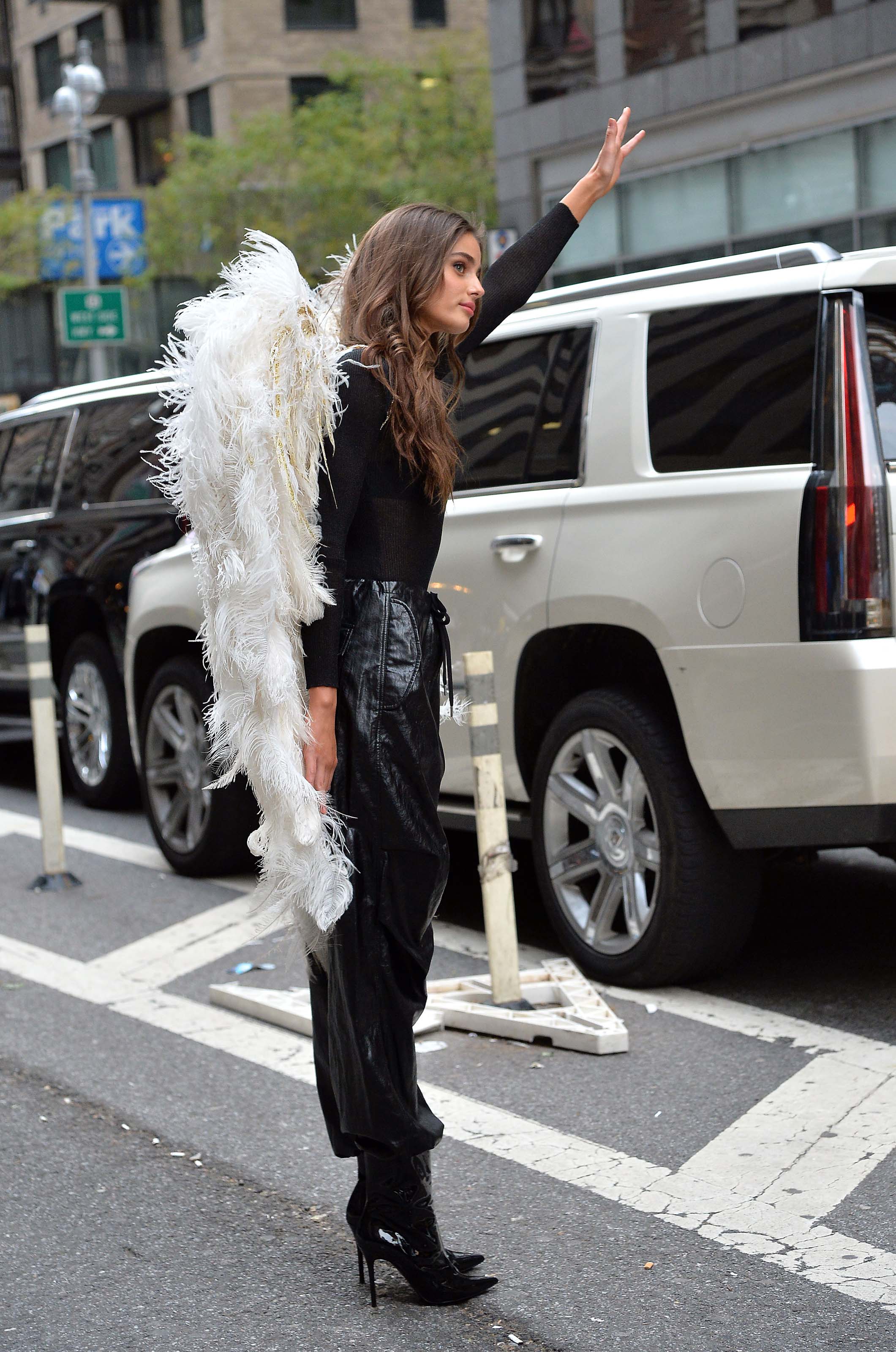 Taylor Hill films a small promo event in NYC showcasing her Angel Wings