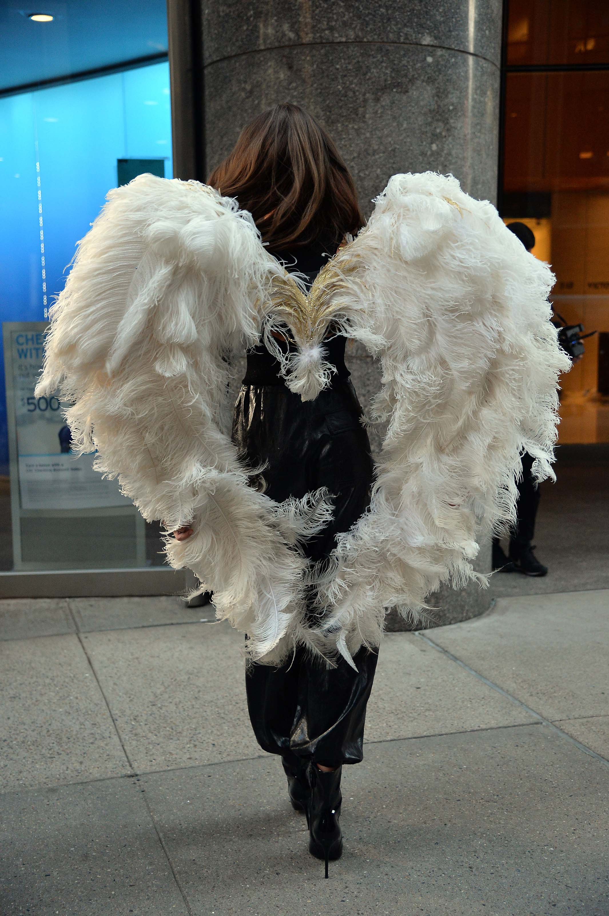 Taylor Hill films a small promo event in NYC showcasing her Angel Wings