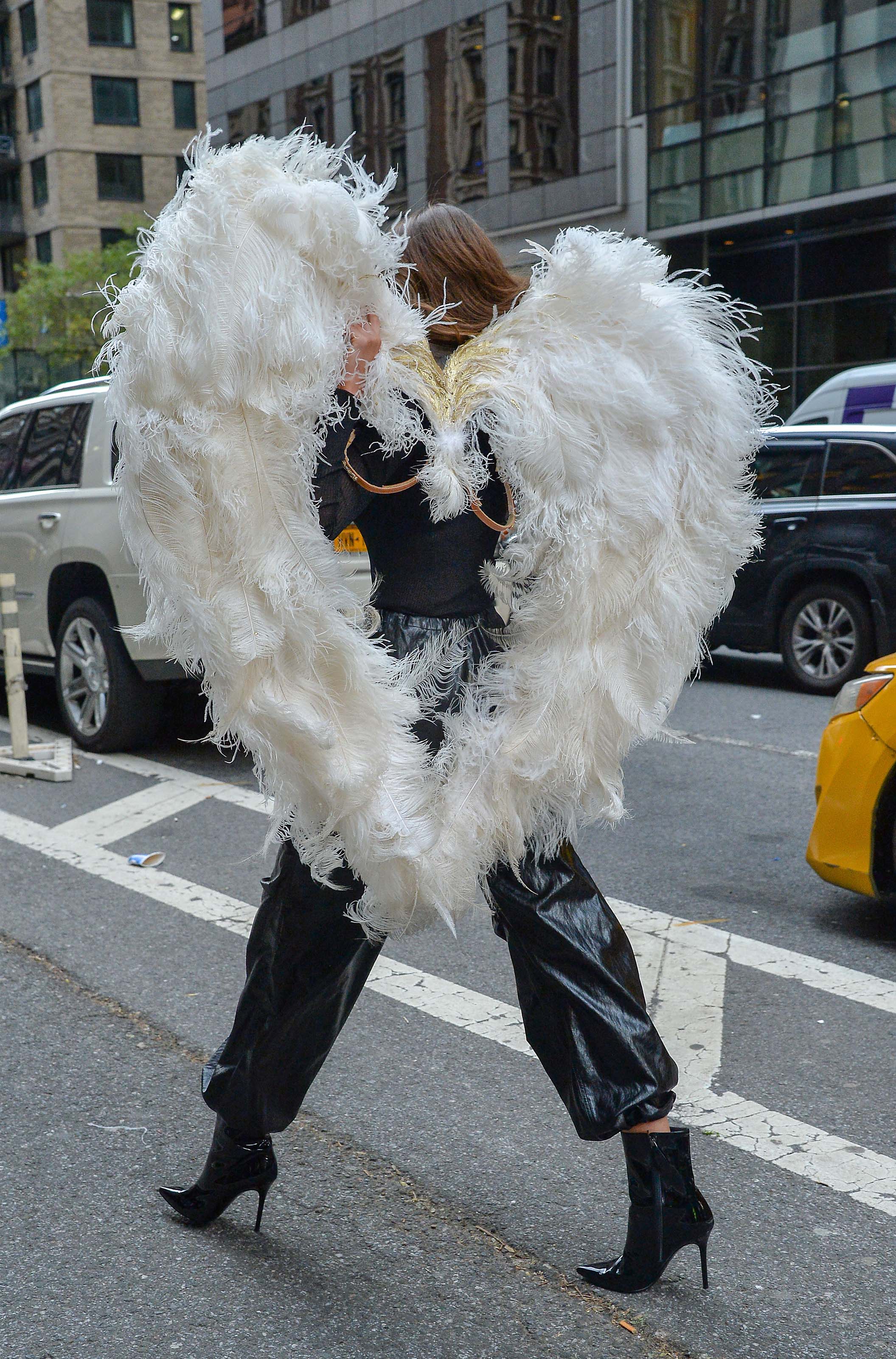 Taylor Hill films a small promo event in NYC showcasing her Angel Wings