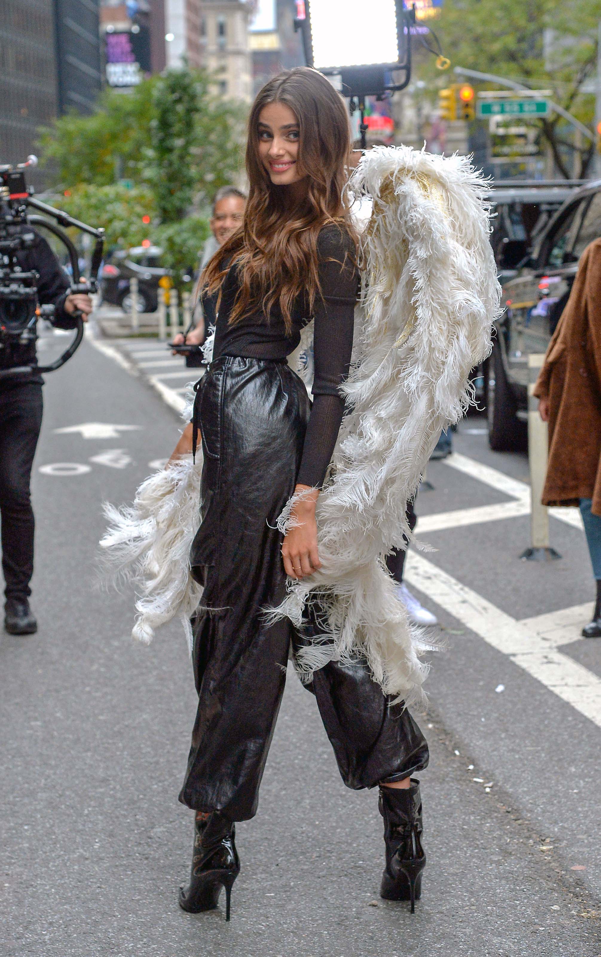 Taylor Hill films a small promo event in NYC showcasing her Angel Wings