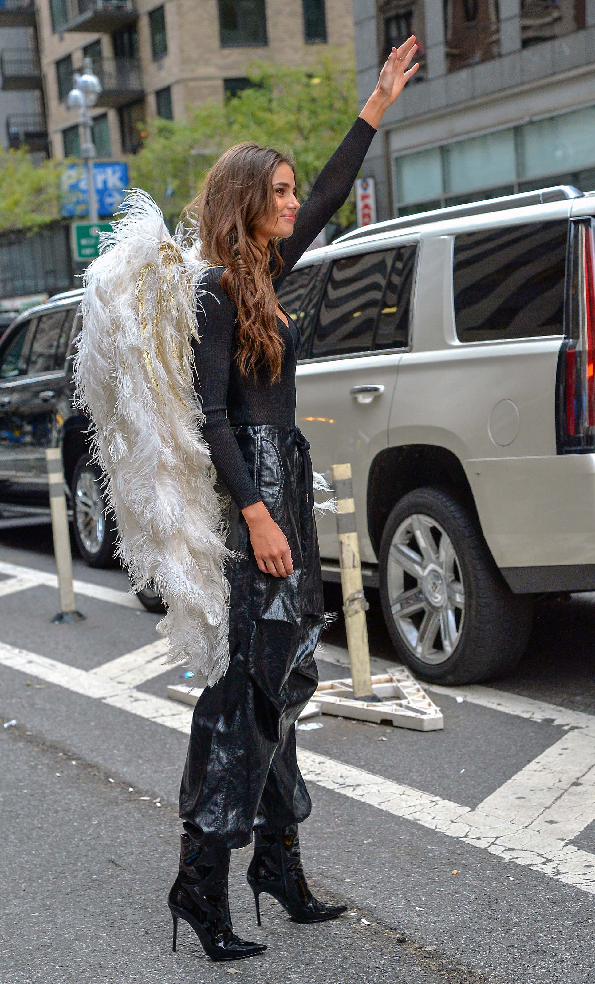 Taylor Hill films a small promo event in NYC showcasing her Angel Wings