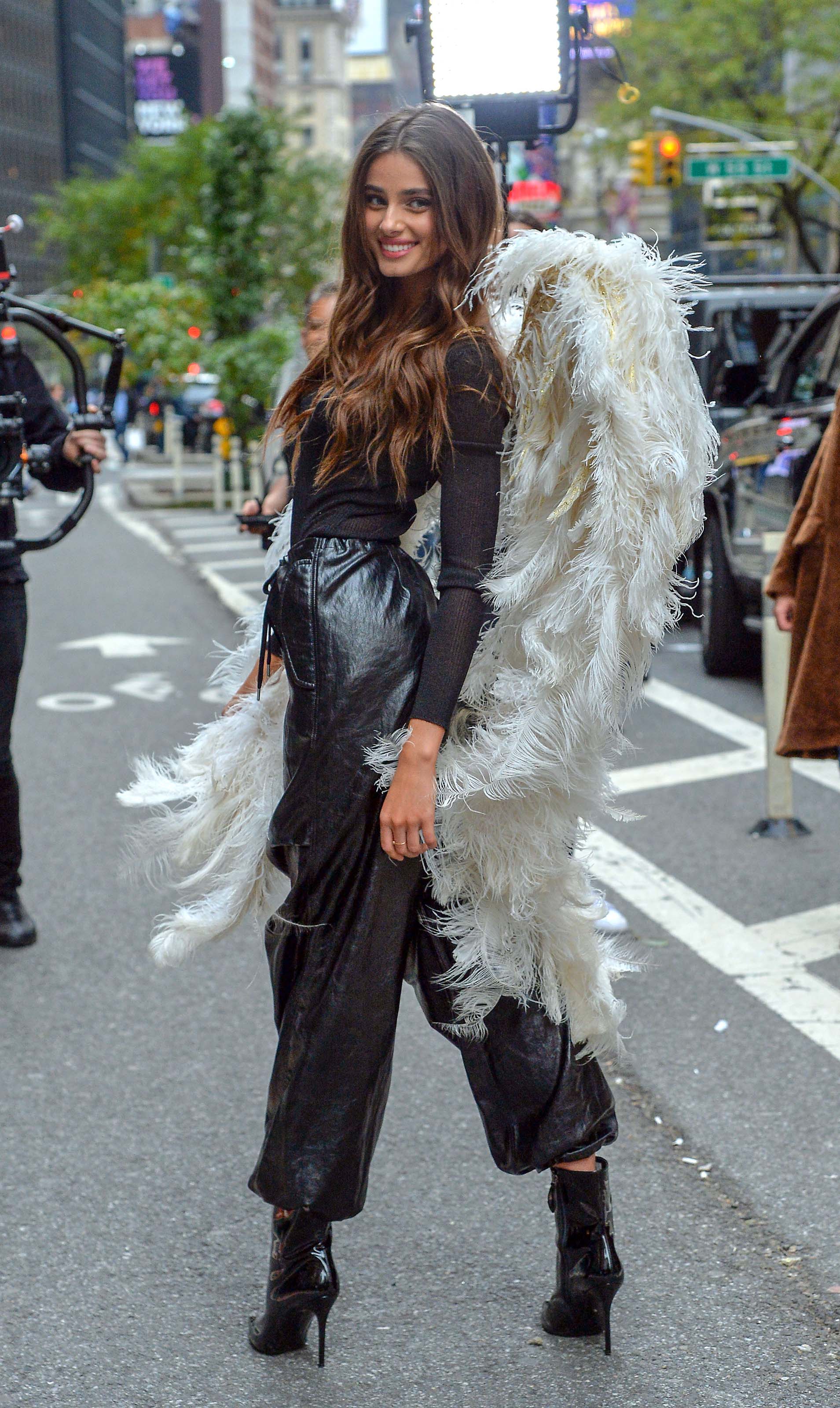 Taylor Hill films a small promo event in NYC showcasing her Angel Wings