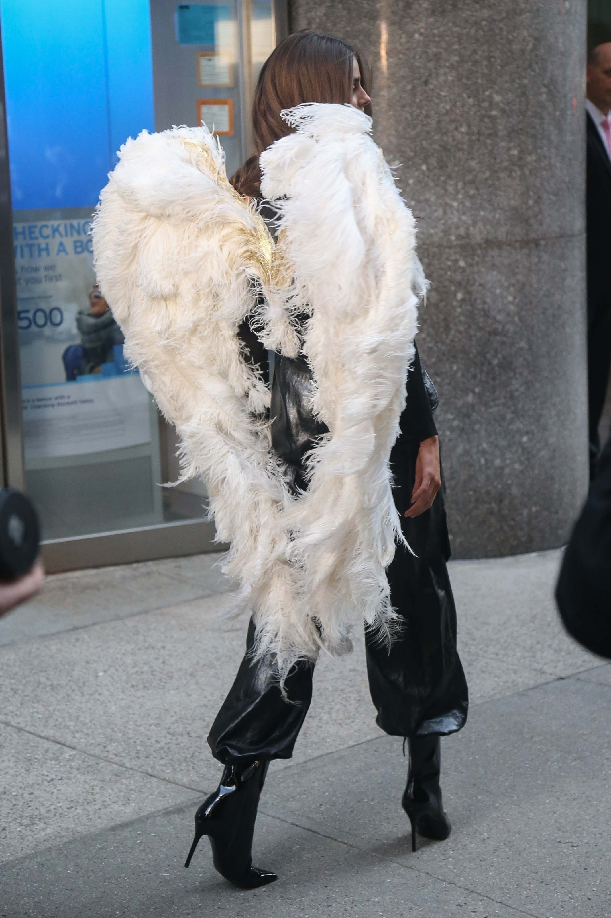 Taylor Hill films a small promo event in NYC showcasing her Angel Wings