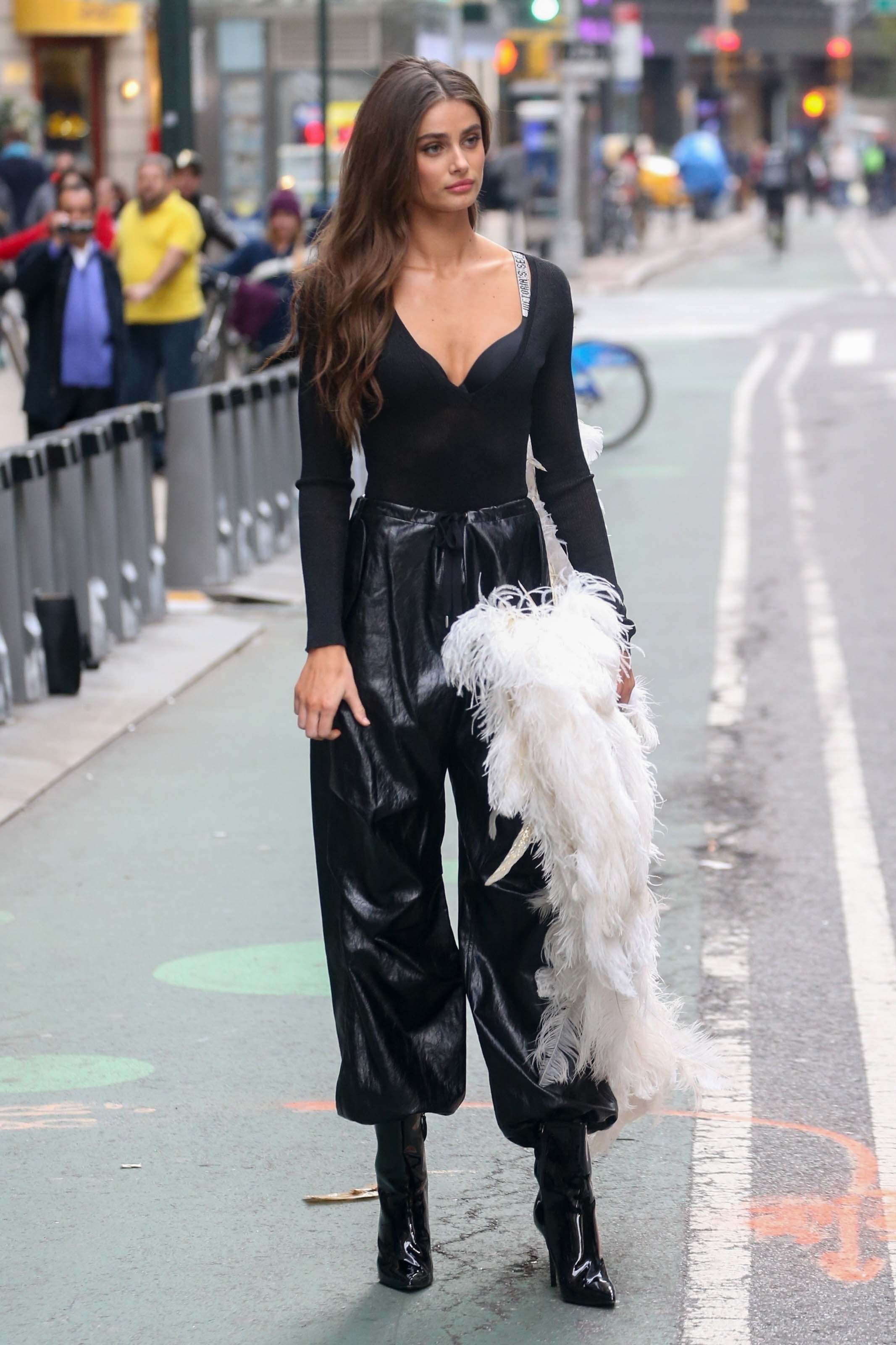 Taylor Hill films a small promo event in NYC showcasing her Angel Wings