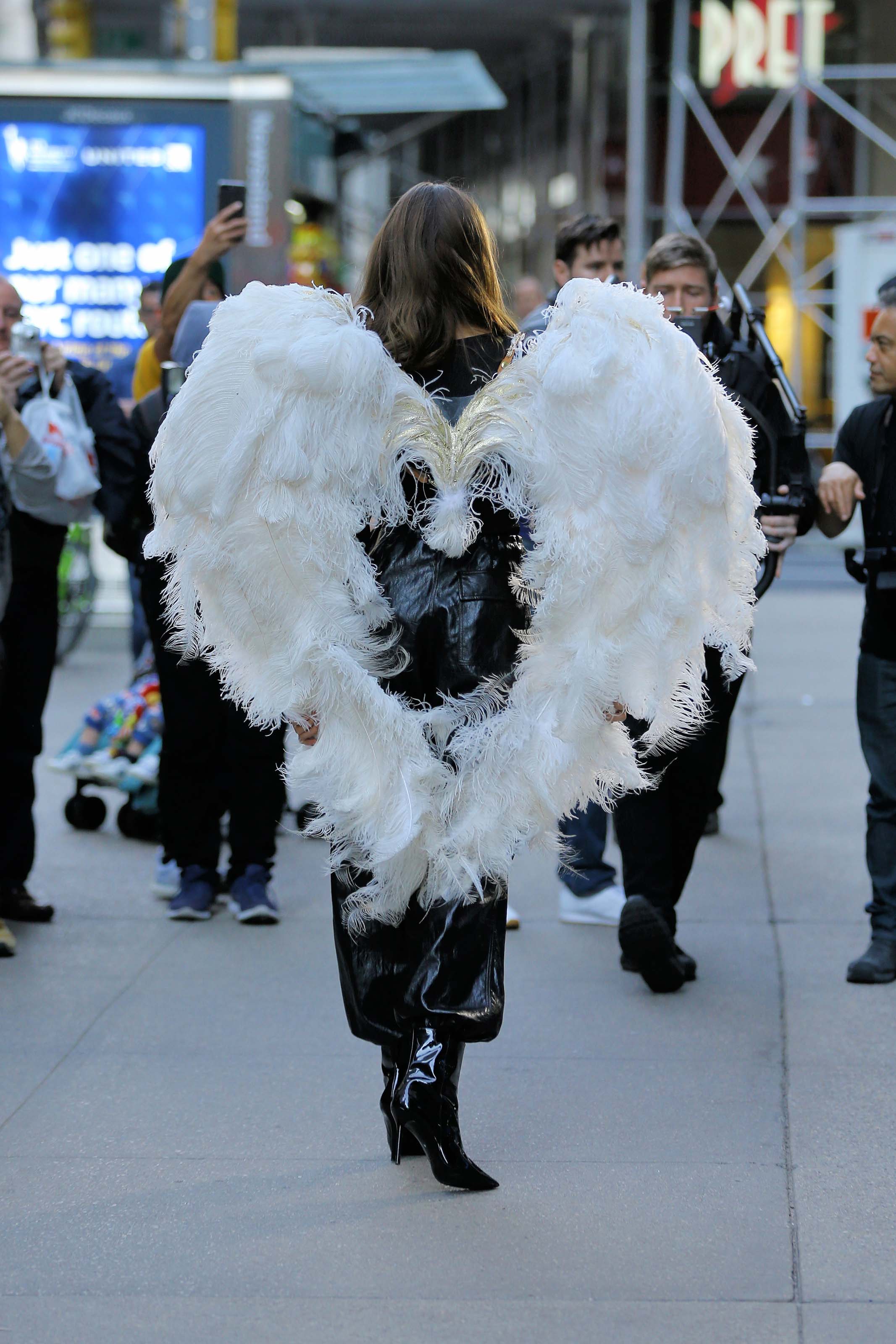 Taylor Hill films a small promo event in NYC showcasing her Angel Wings