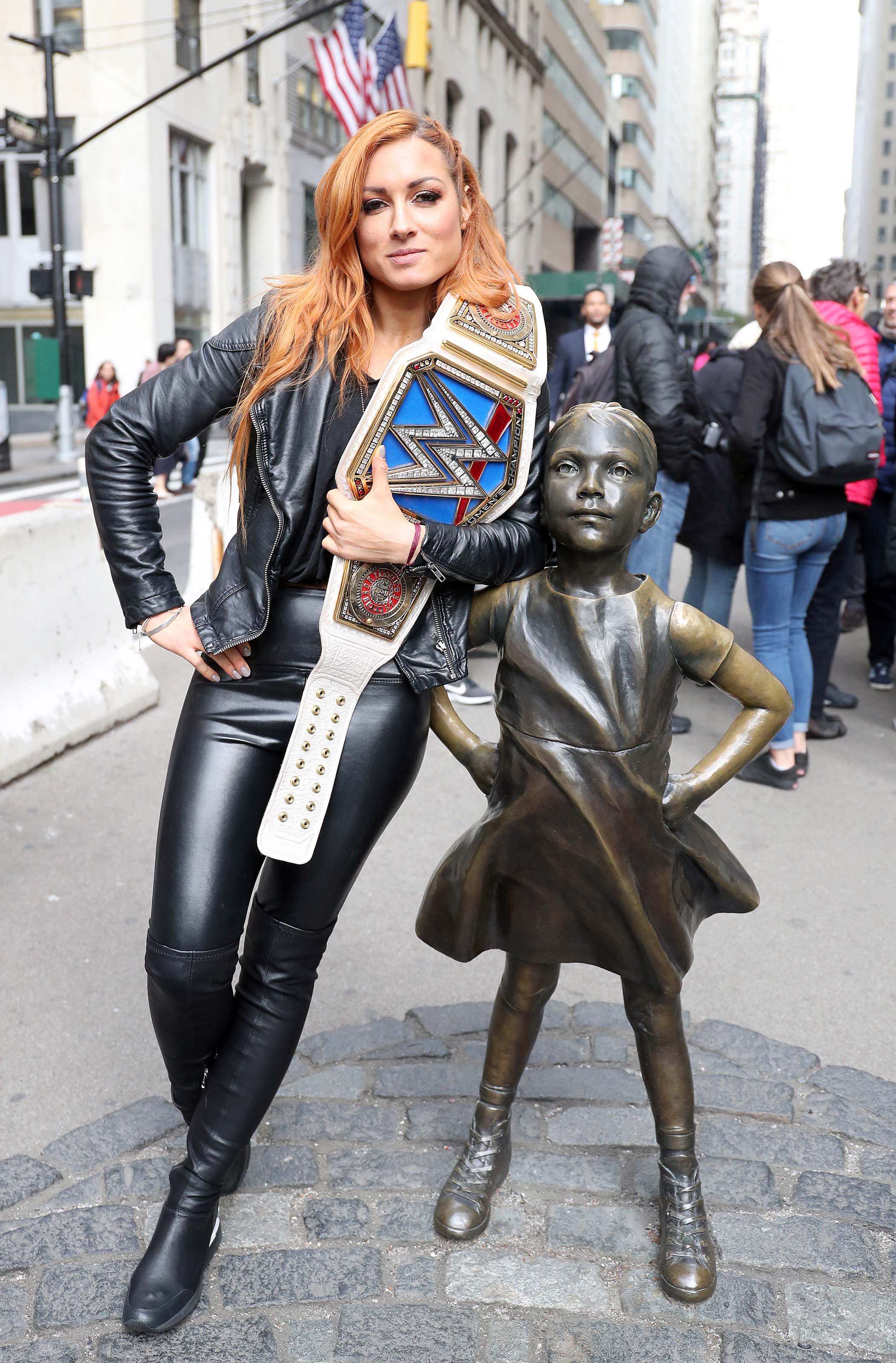 Becky Lynch at Fearless Girl statue in the Wall Street