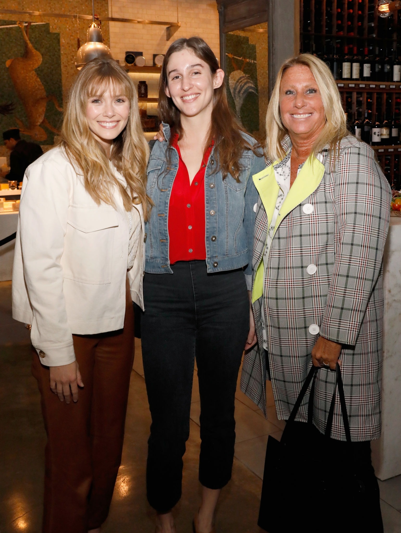 Elizabeth Olsen attends EBMRF’s Sip, Savor & Support Benefit