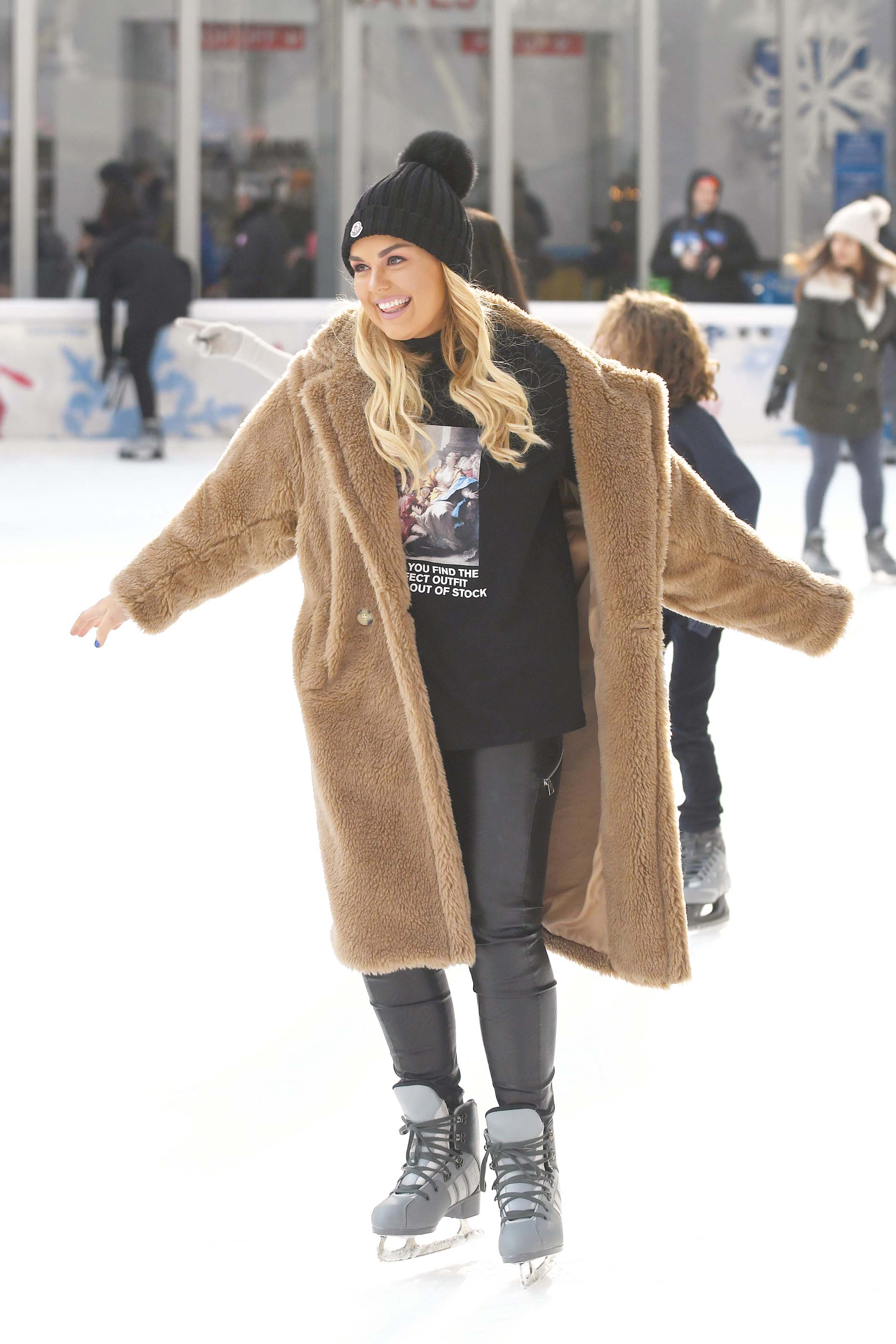 Tallia Storm ice skating in Bryant Park