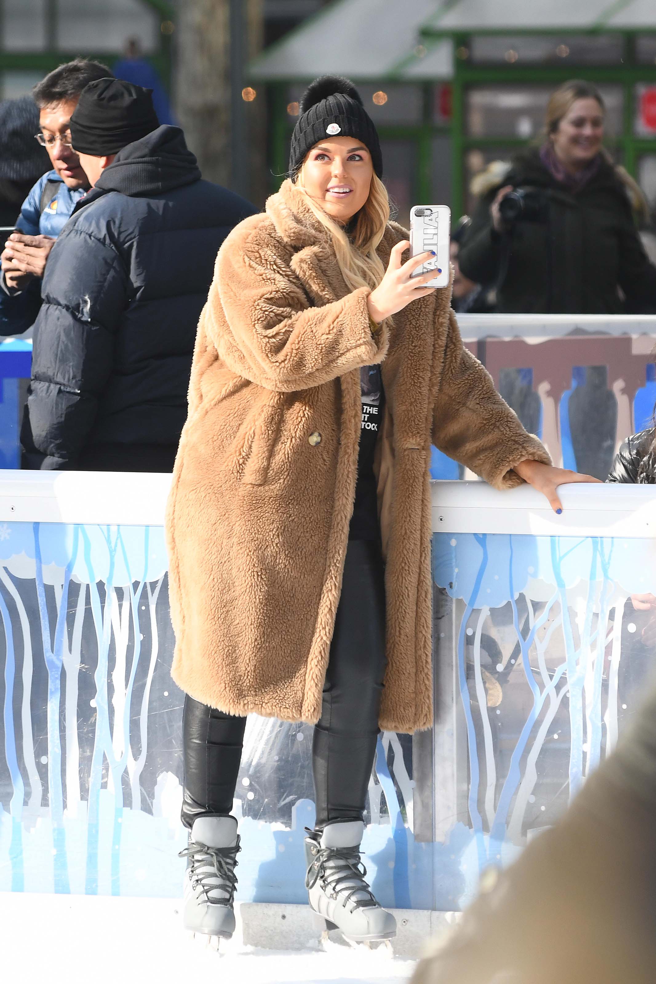 Tallia Storm ice skating in Bryant Park