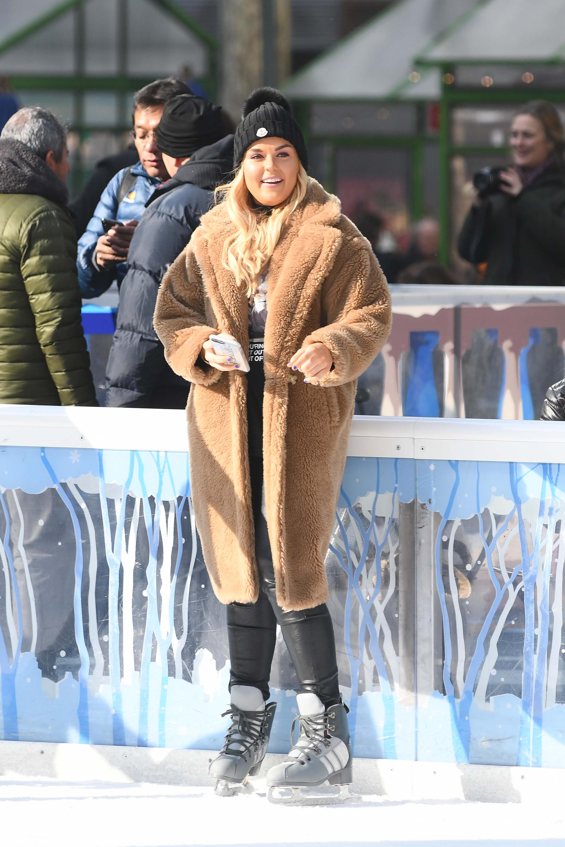 Tallia Storm ice skating in Bryant Park