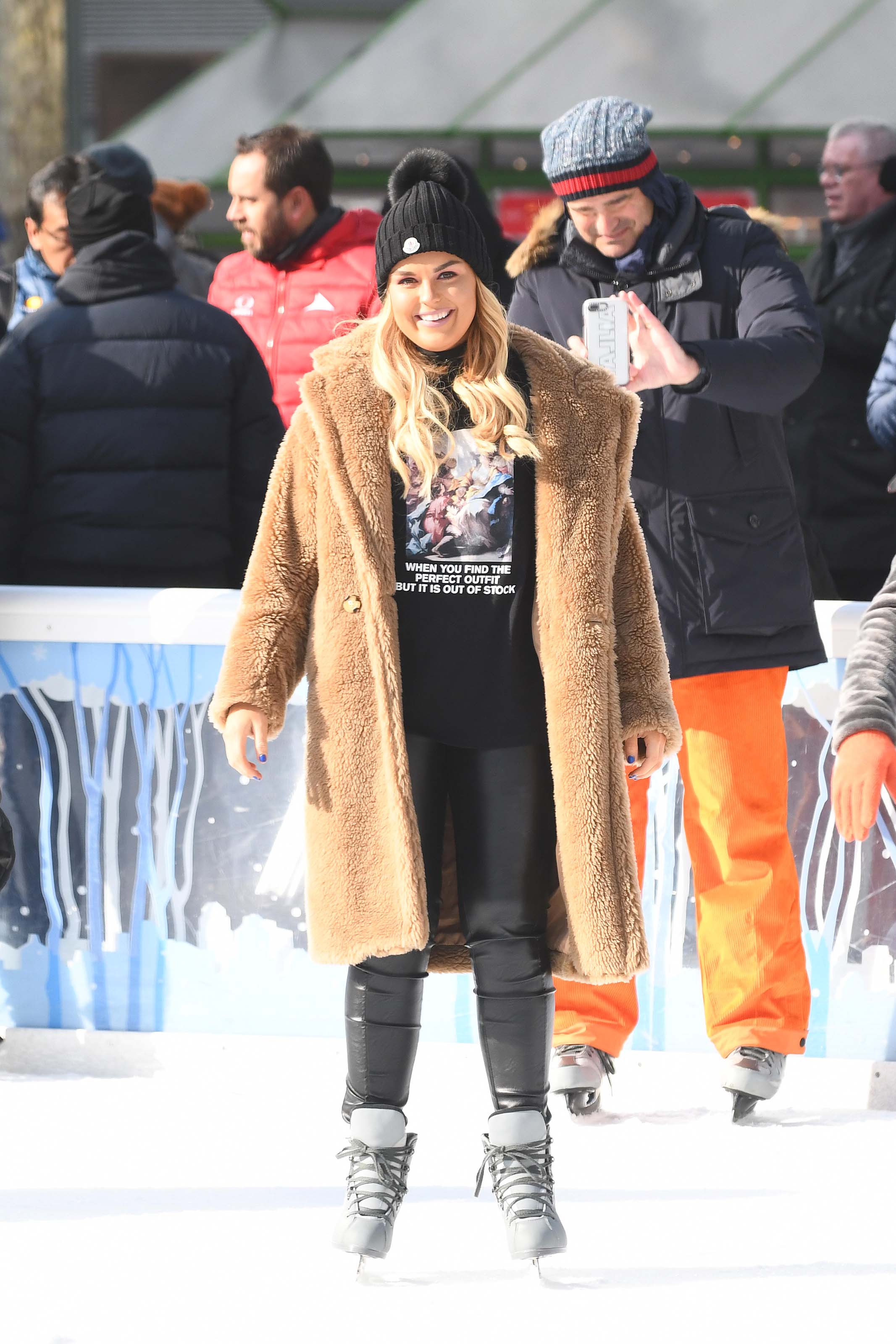 Tallia Storm ice skating in Bryant Park