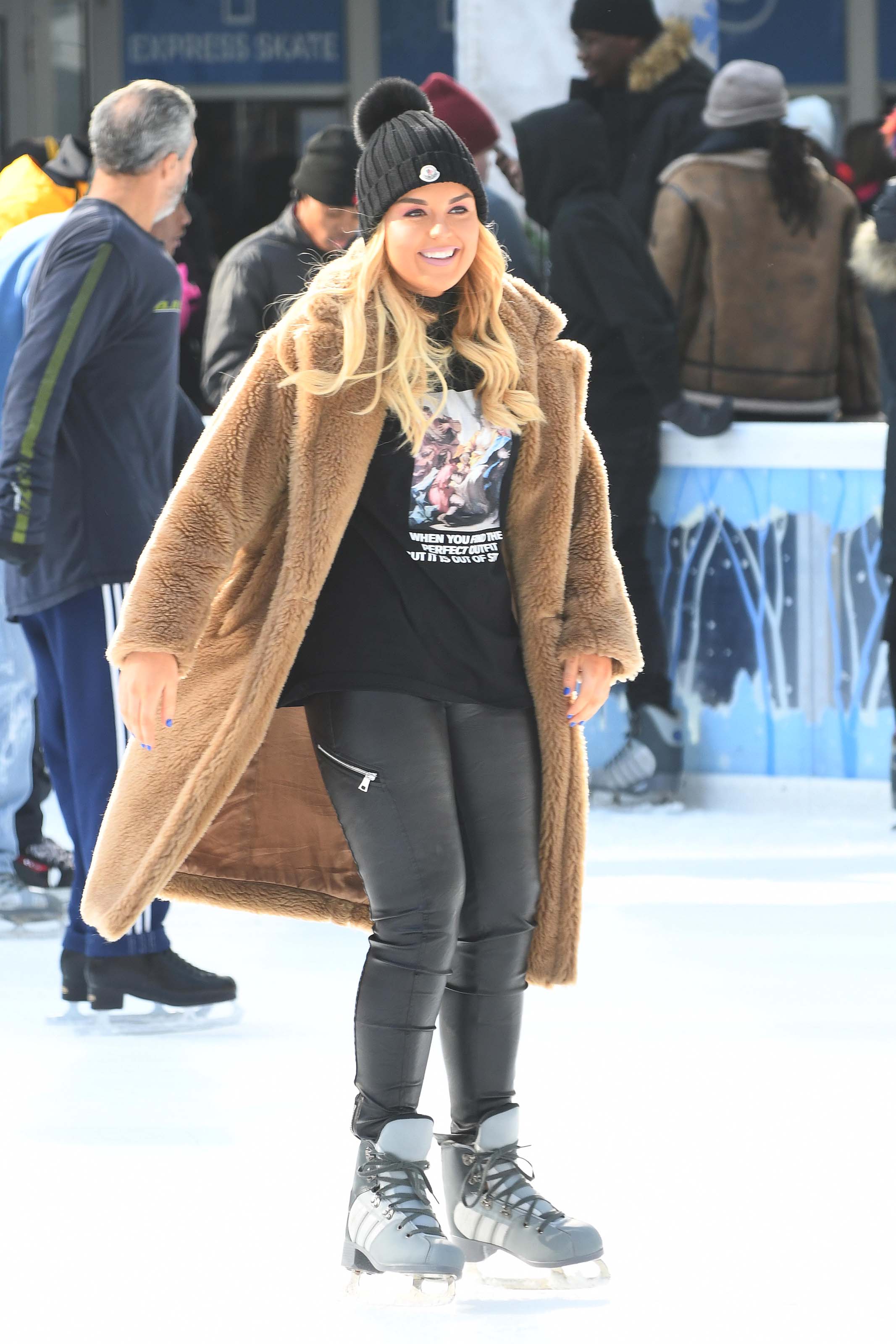 Tallia Storm ice skating in Bryant Park