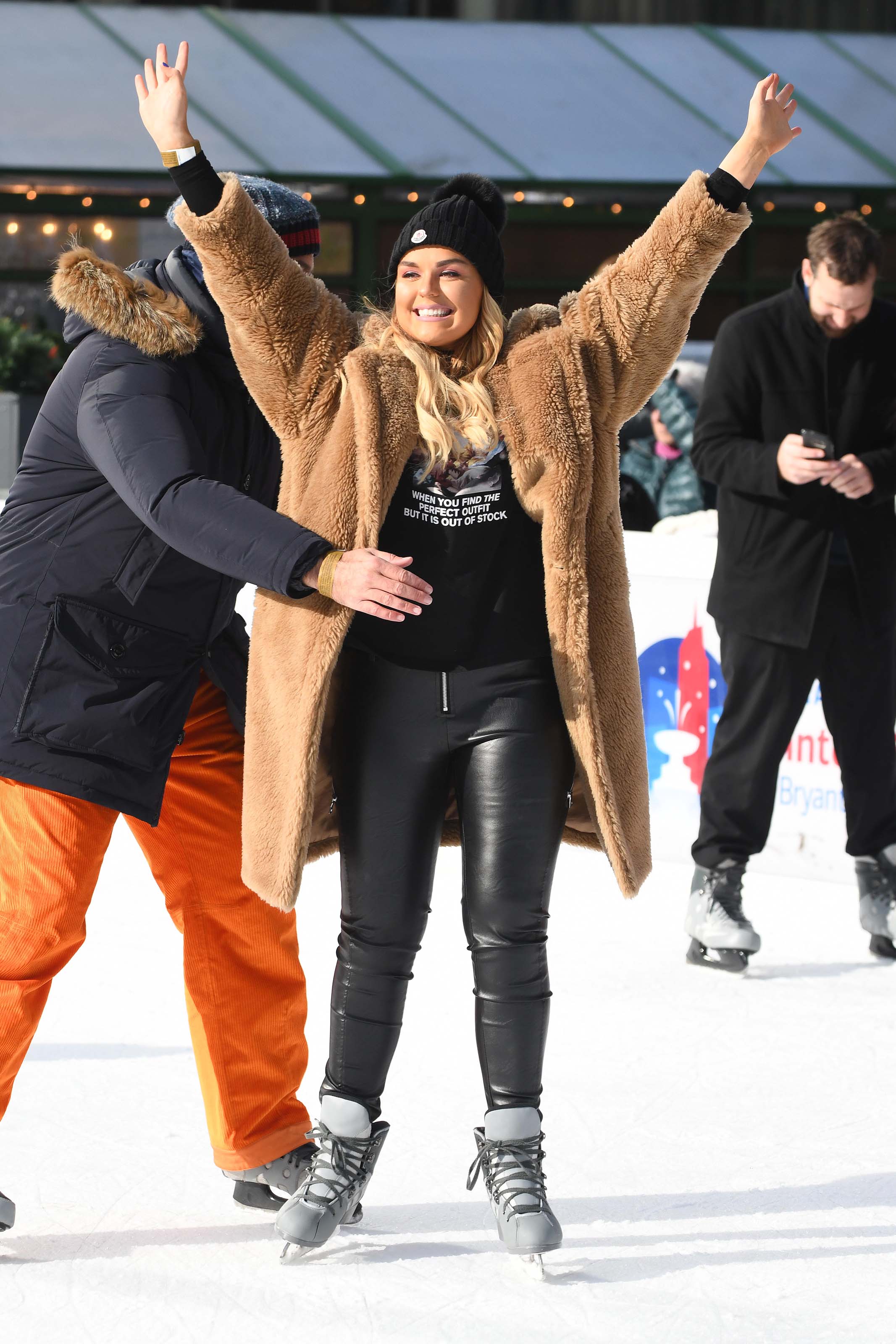 Tallia Storm ice skating in Bryant Park