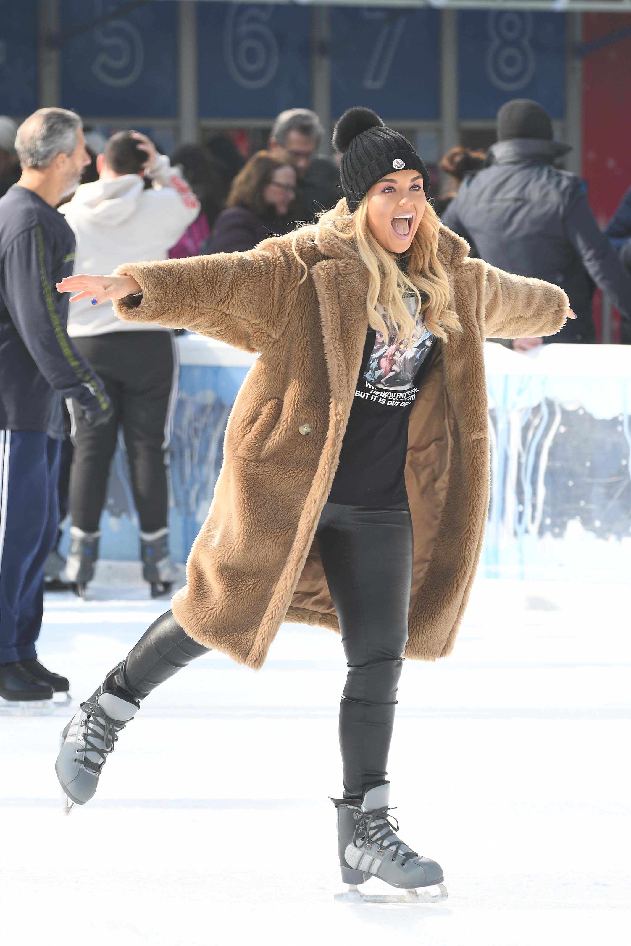 Tallia Storm ice skating in Bryant Park