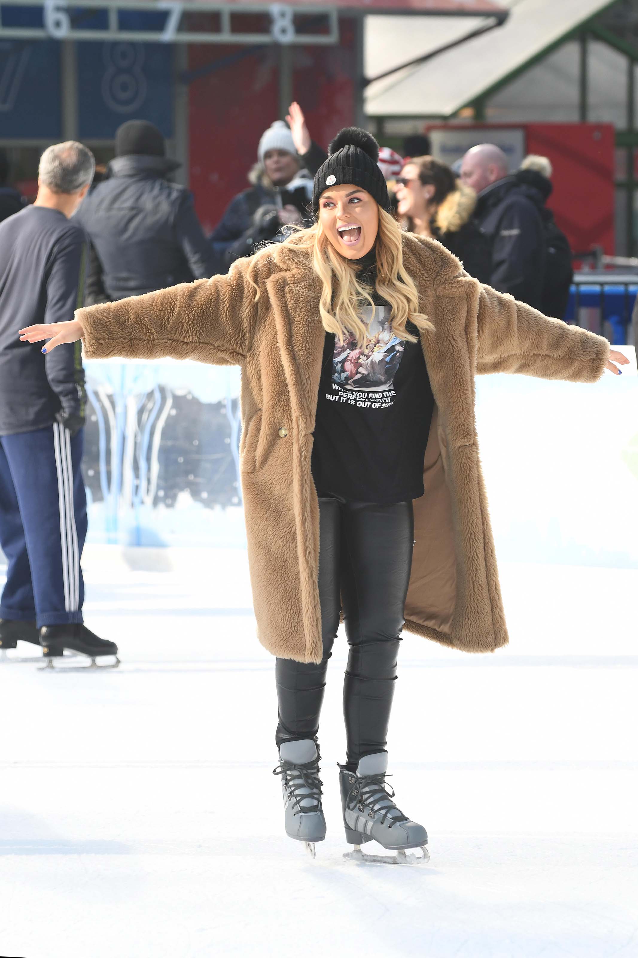 Tallia Storm ice skating in Bryant Park