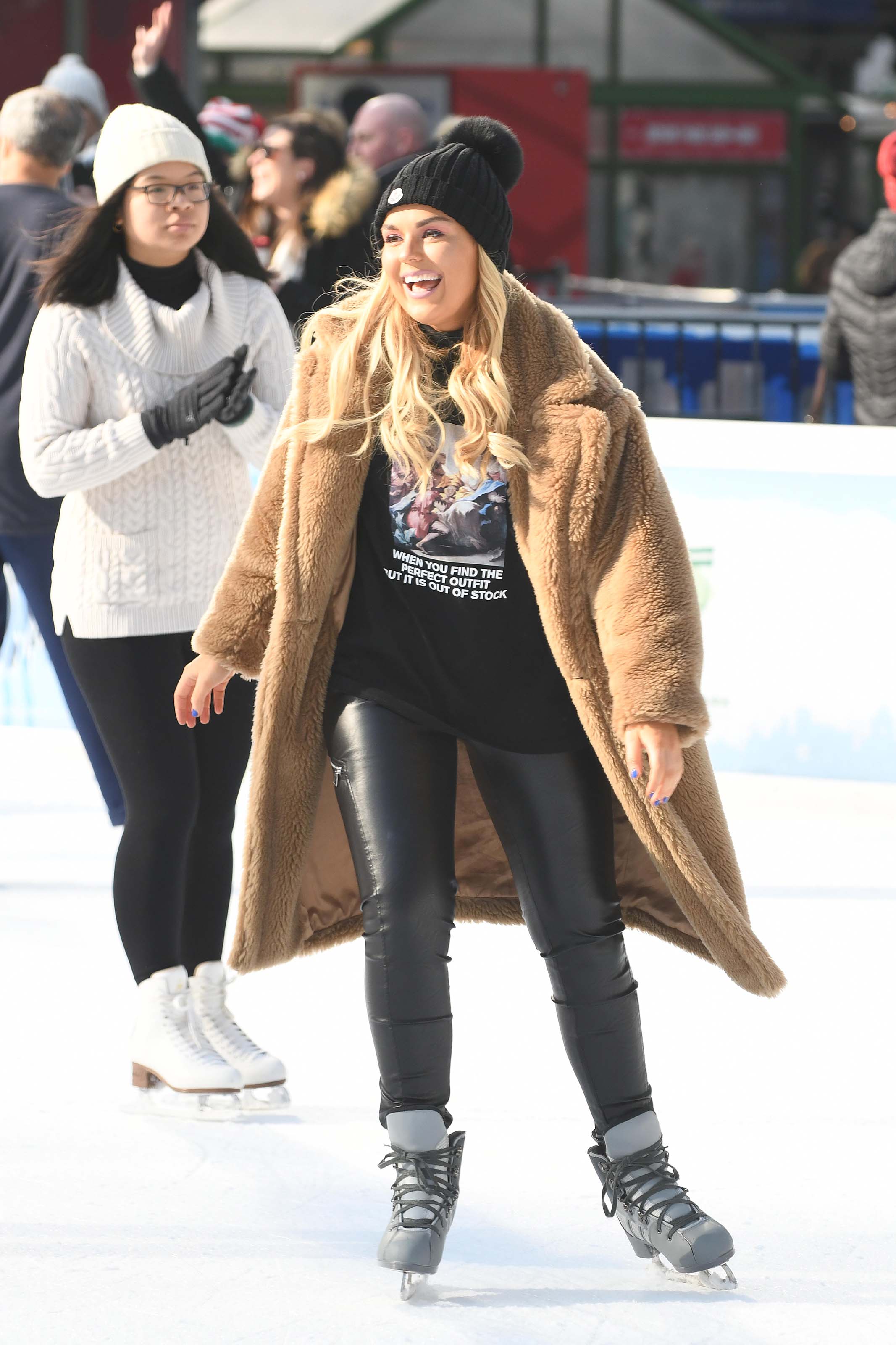 Tallia Storm ice skating in Bryant Park