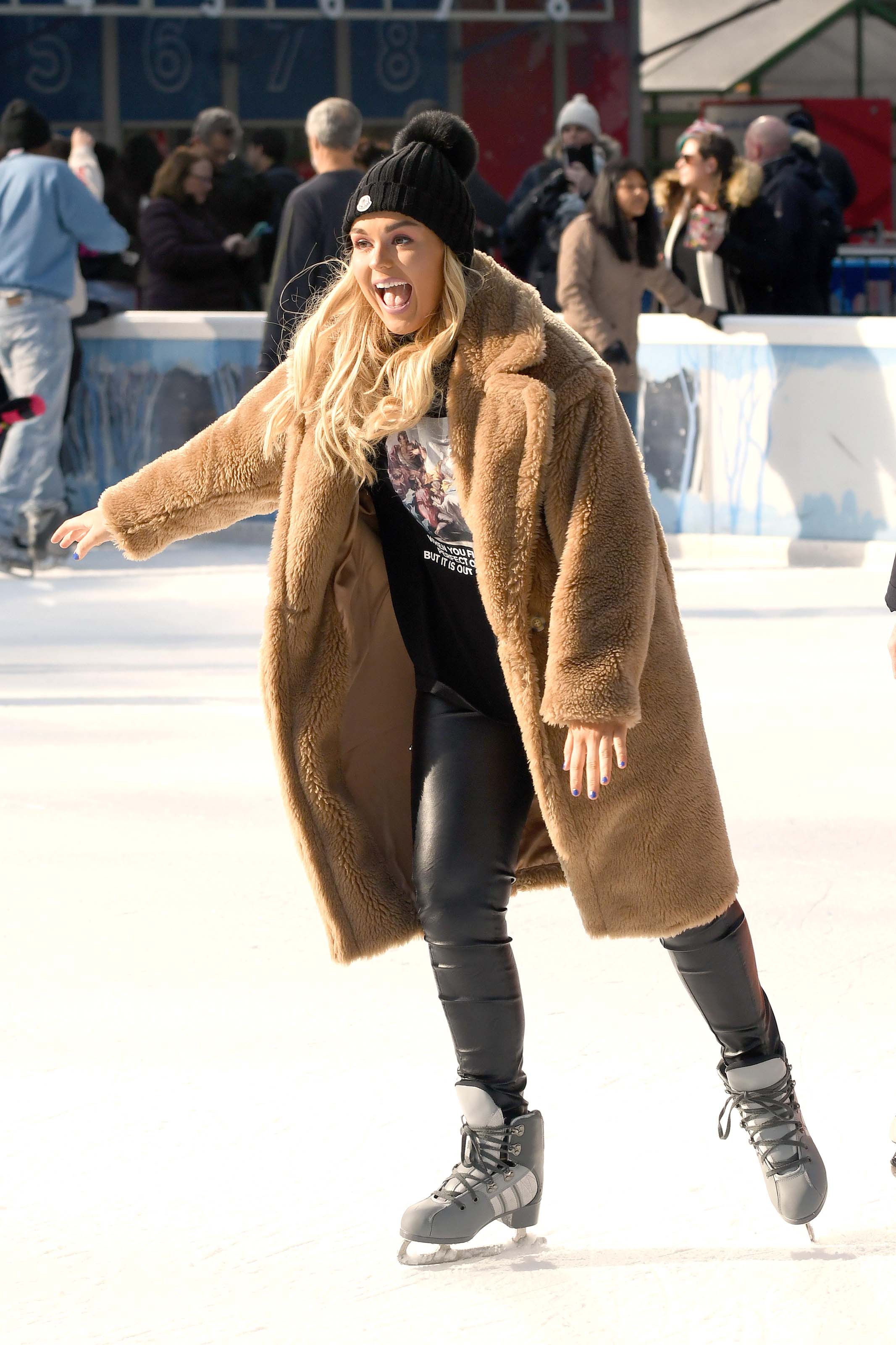 Tallia Storm ice skating in Bryant Park