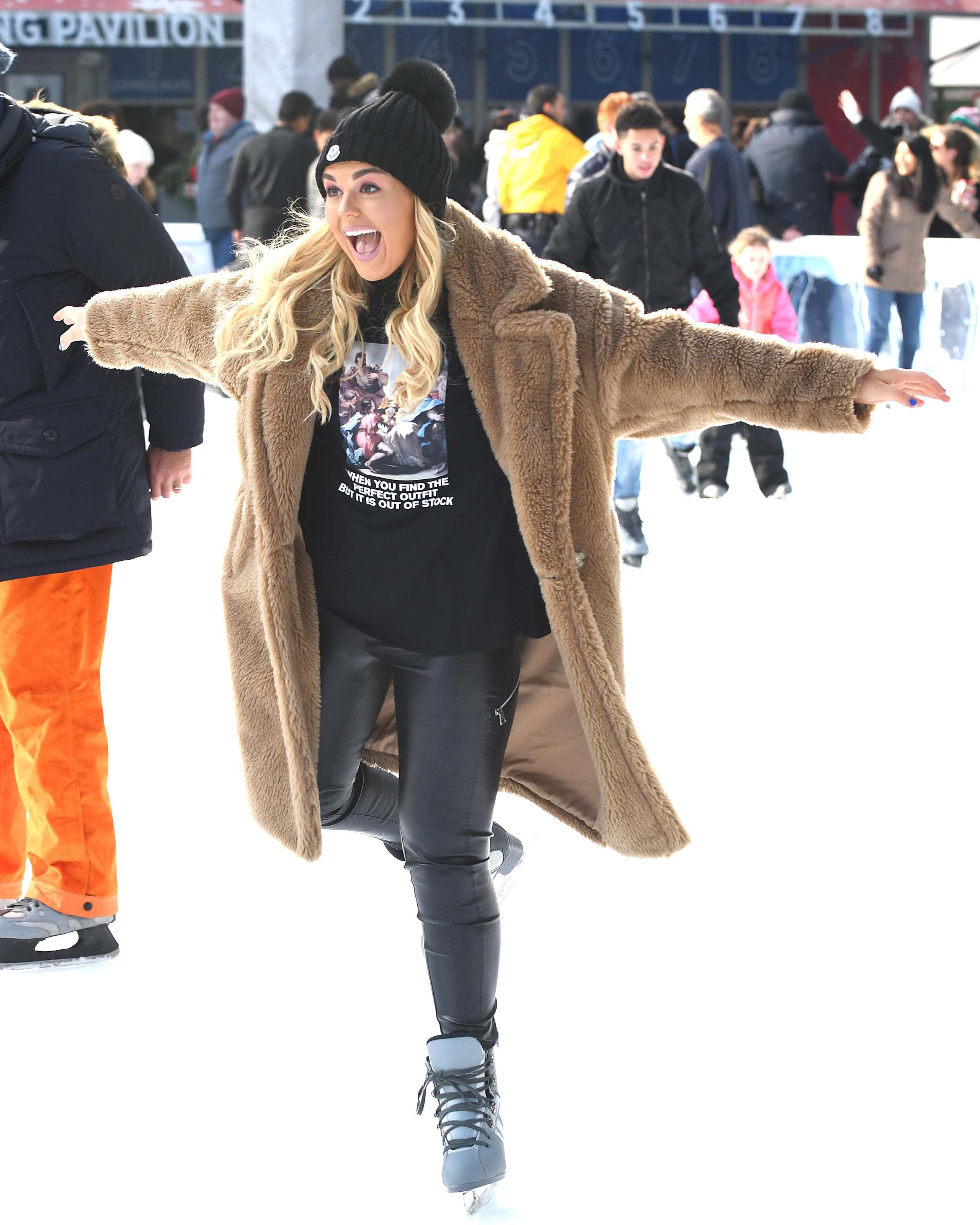 Tallia Storm ice skating in Bryant Park