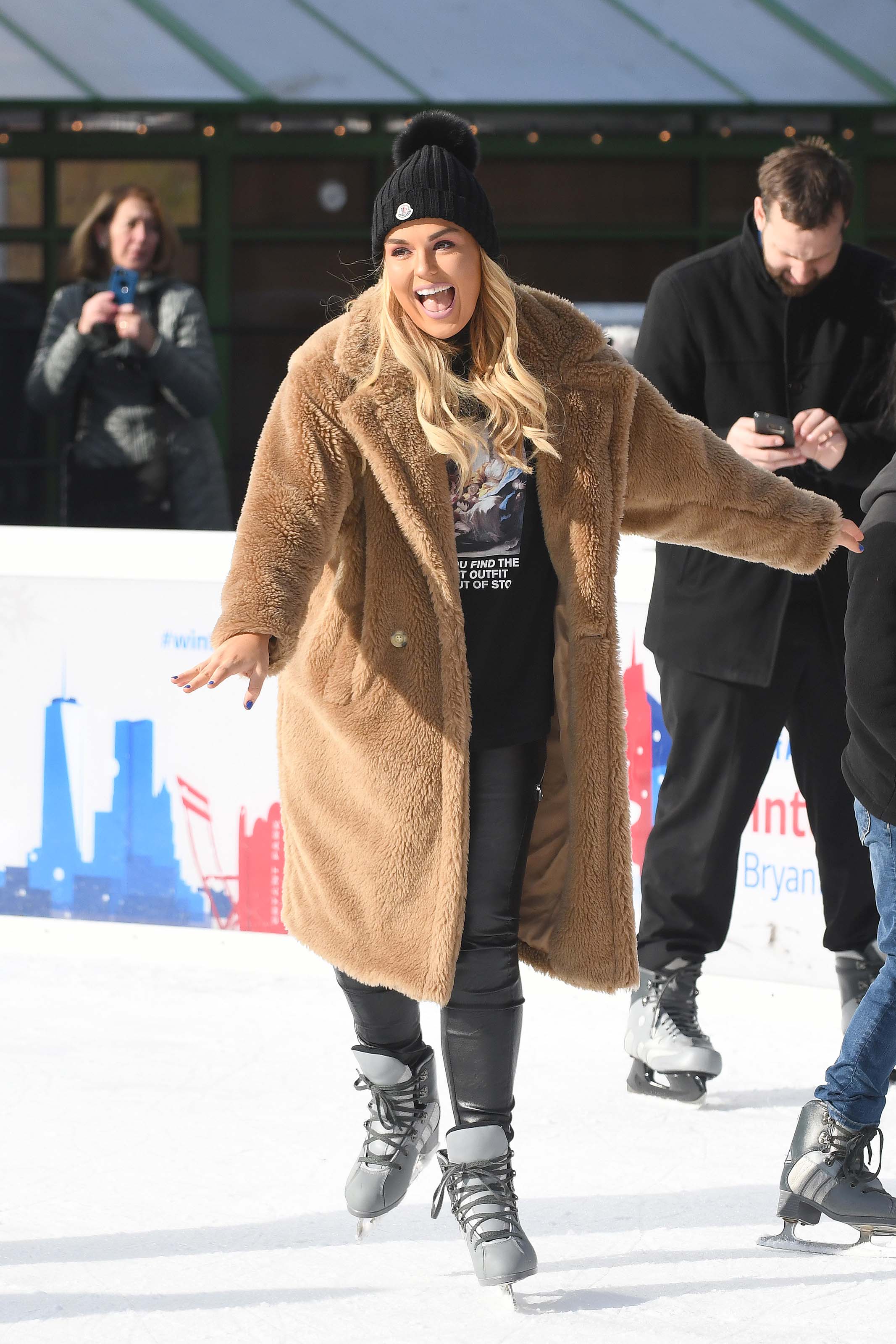 Tallia Storm ice skating in Bryant Park