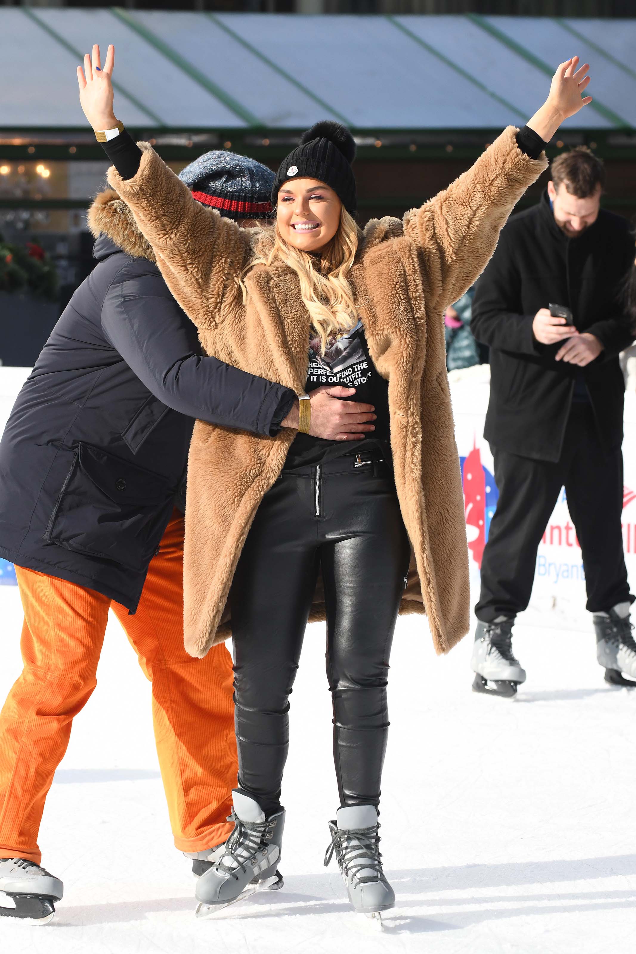 Tallia Storm ice skating in Bryant Park