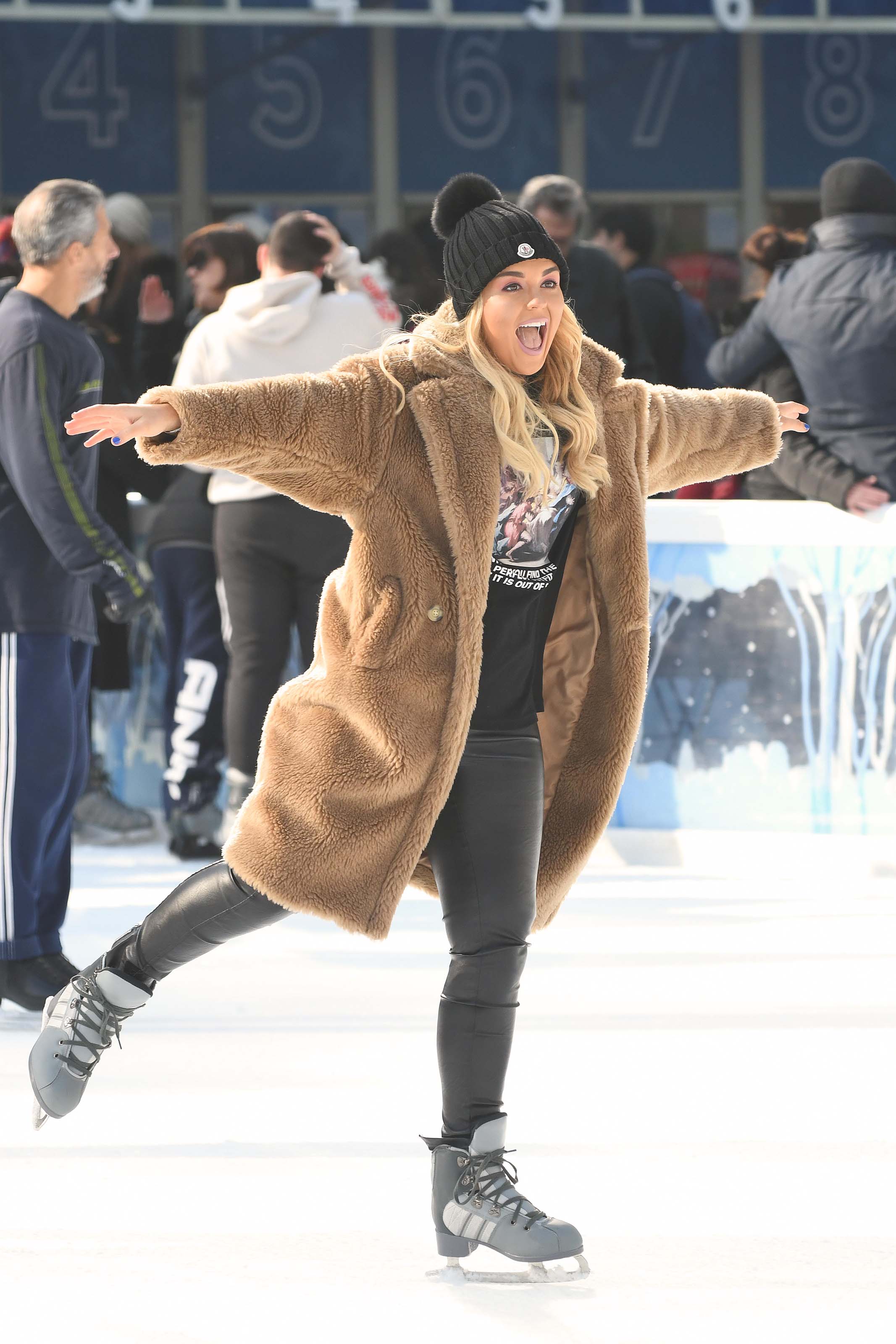 Tallia Storm ice skating in Bryant Park