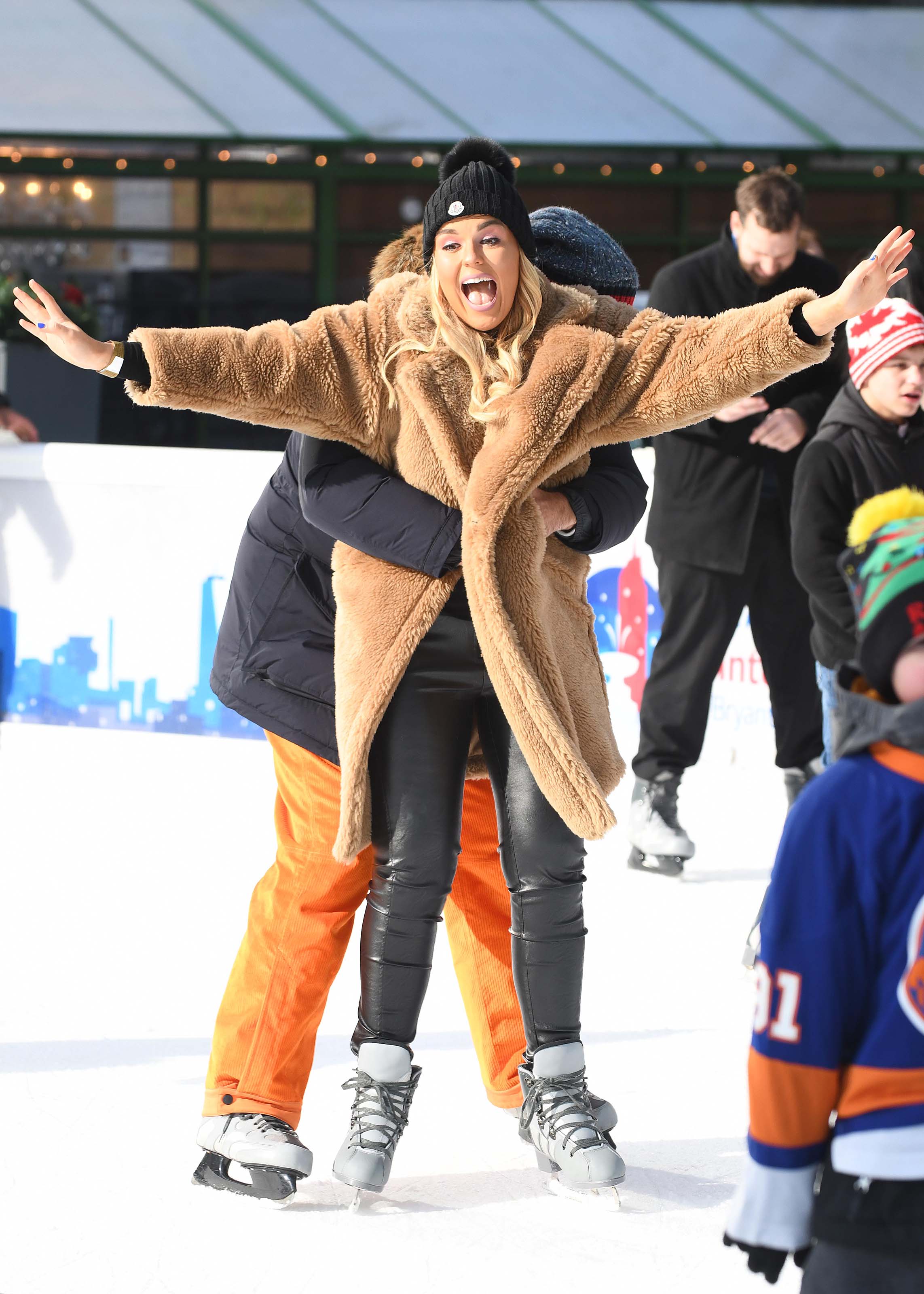 Tallia Storm ice skating in Bryant Park